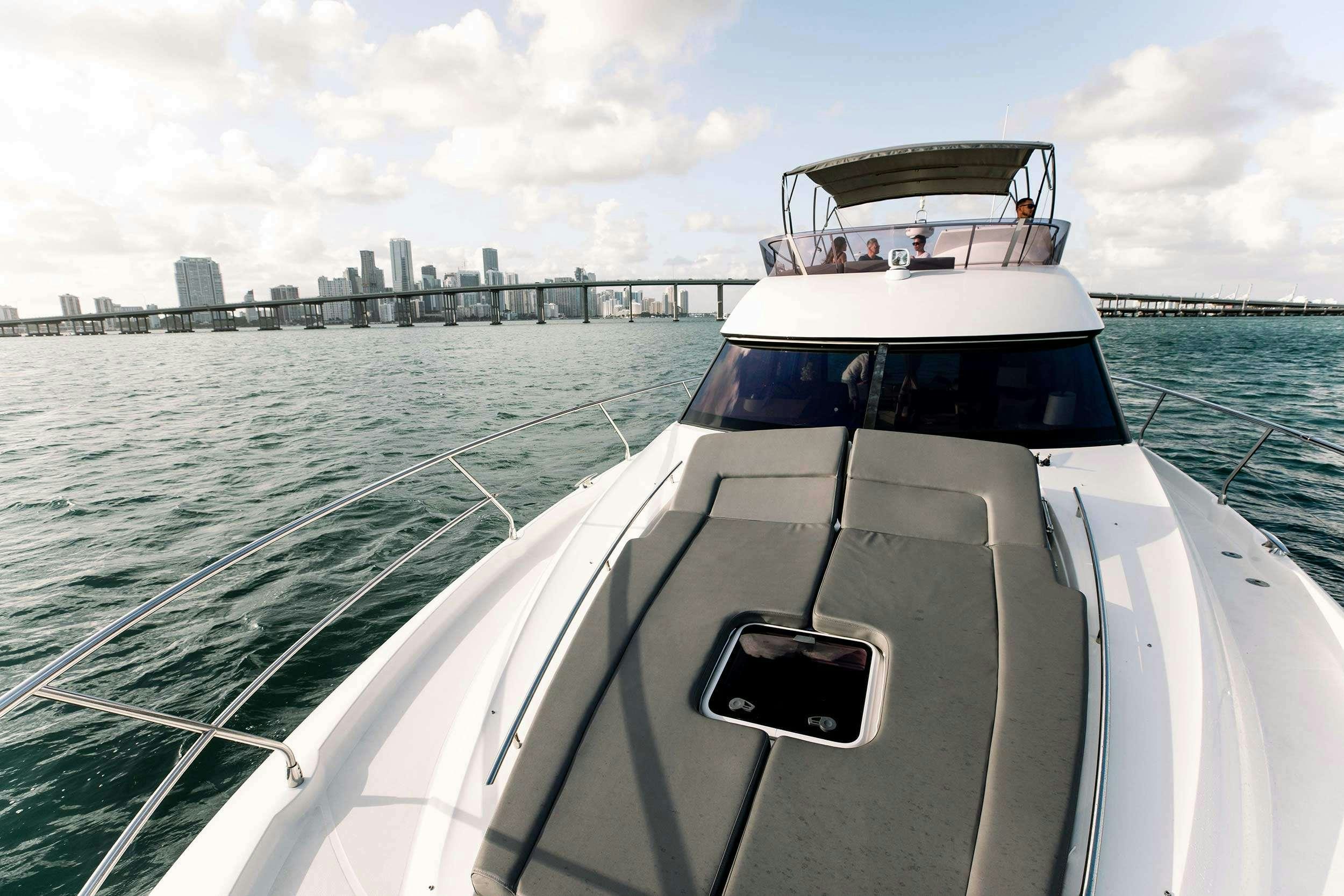 a boat on the water aboard Patinga, Fort Lauderdale Yacht for Charter