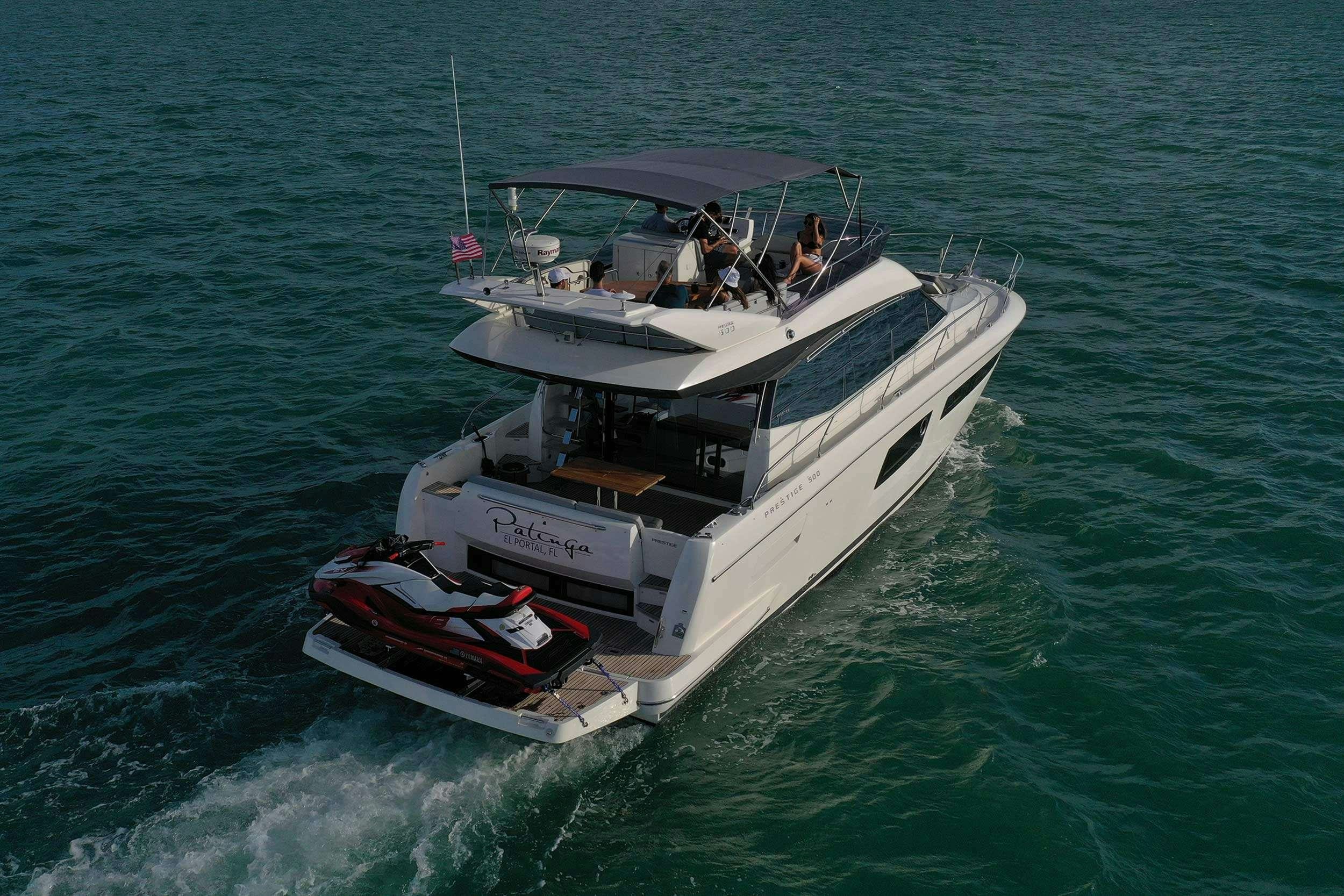 a boat with people on it aboard Patinga, Fort Lauderdale Yacht for Charter