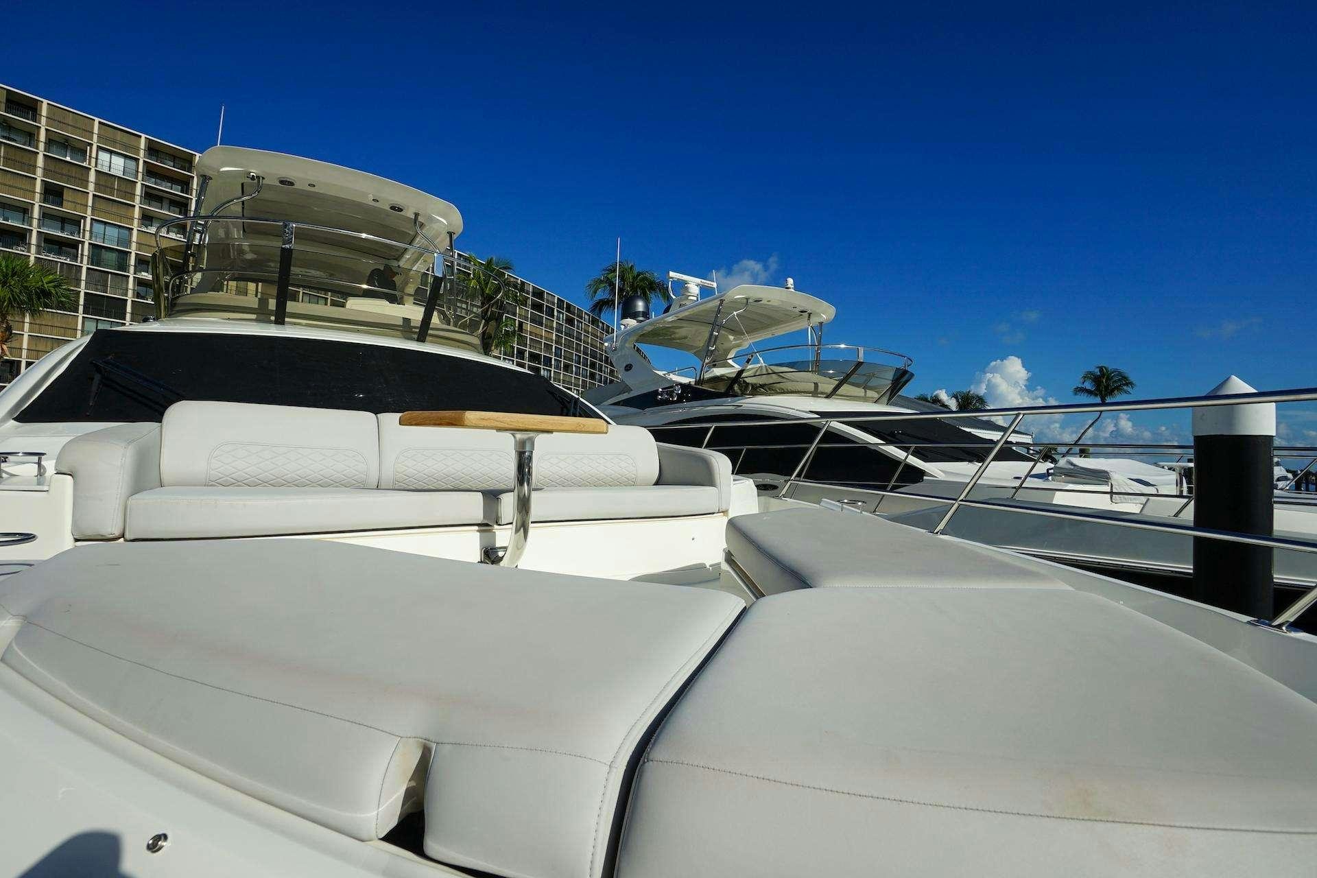 a white car with a large windshield aboard ISLANDER Yacht for Charter