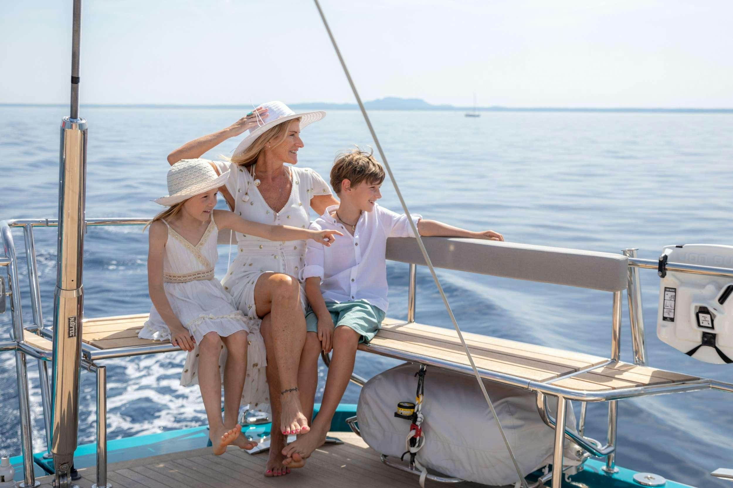 a group of people on a boat aboard KARIBU Yacht for Charter