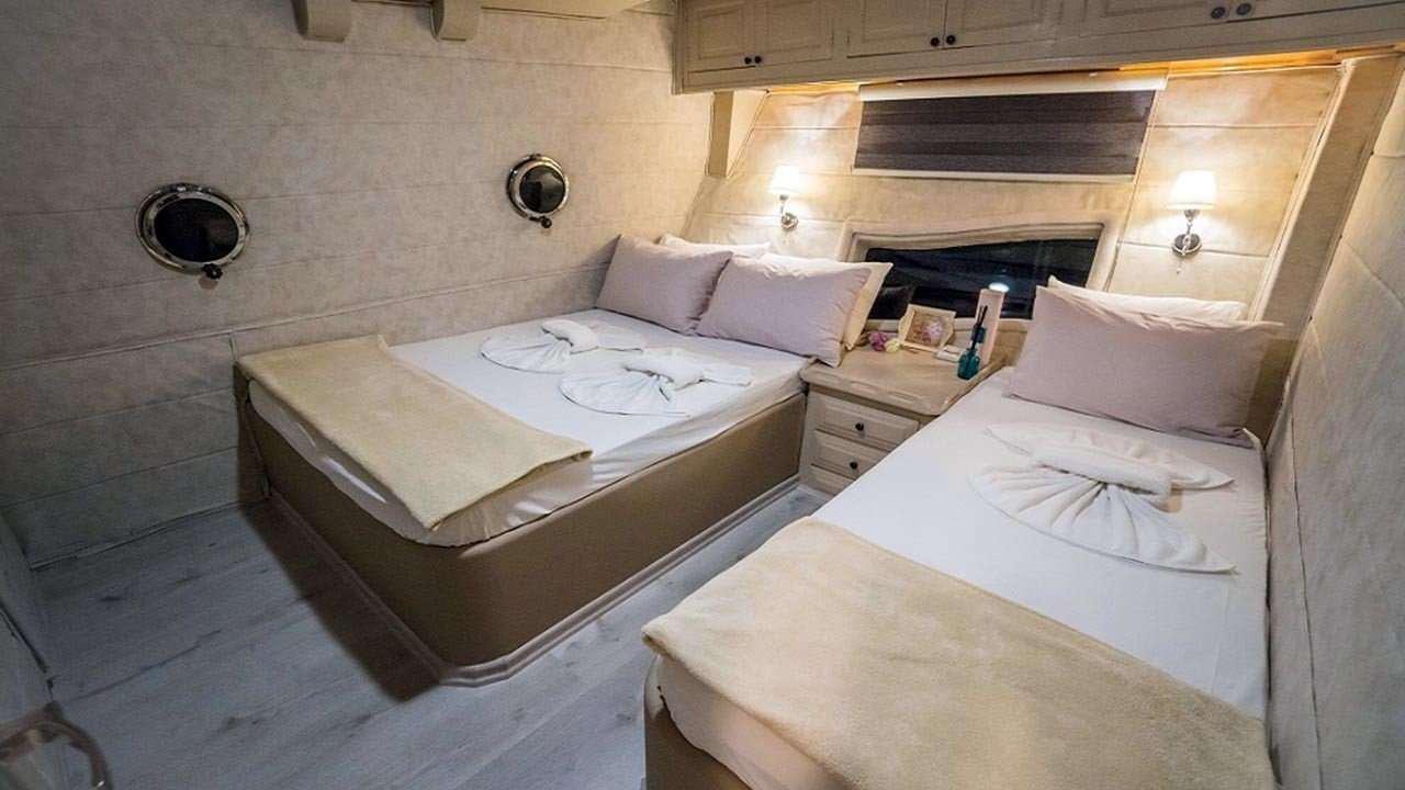 a room with two beds aboard AMETIST A Yacht for Charter