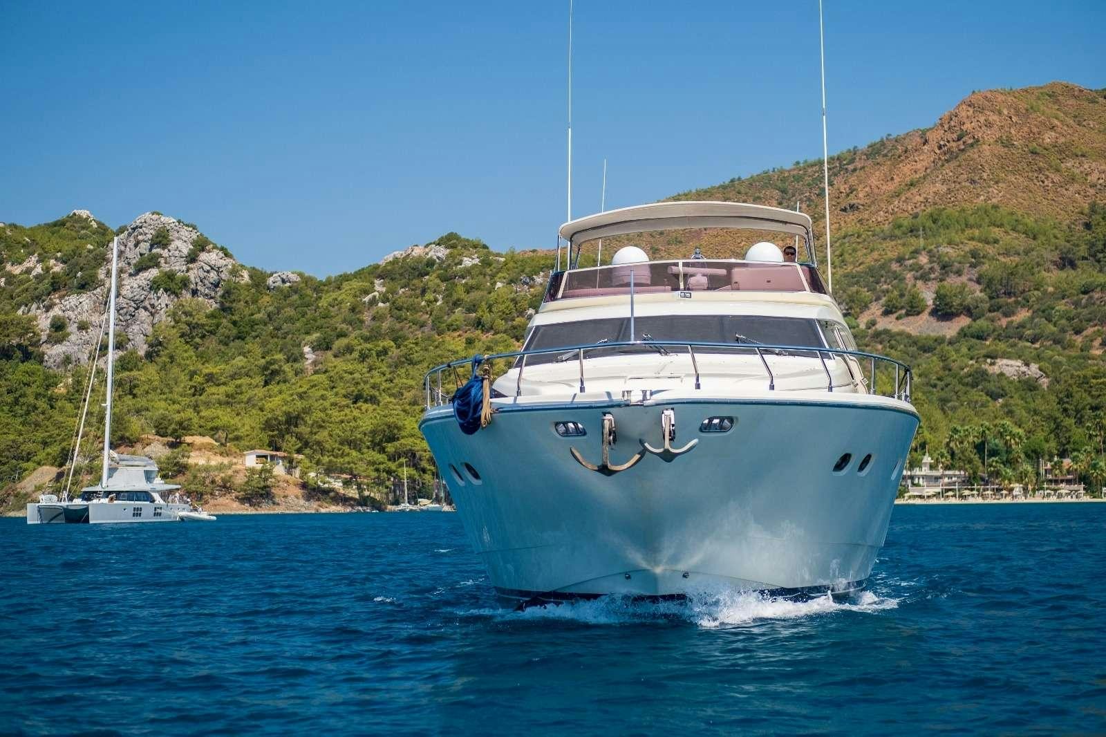 a large white boat in the water aboard MIO AMORE Yacht for Charter