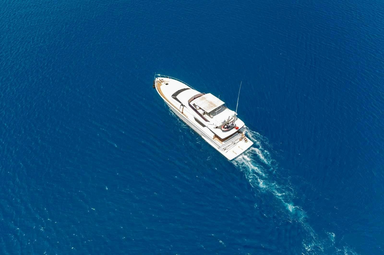 a white boat in the water aboard MIO AMORE Yacht for Charter
