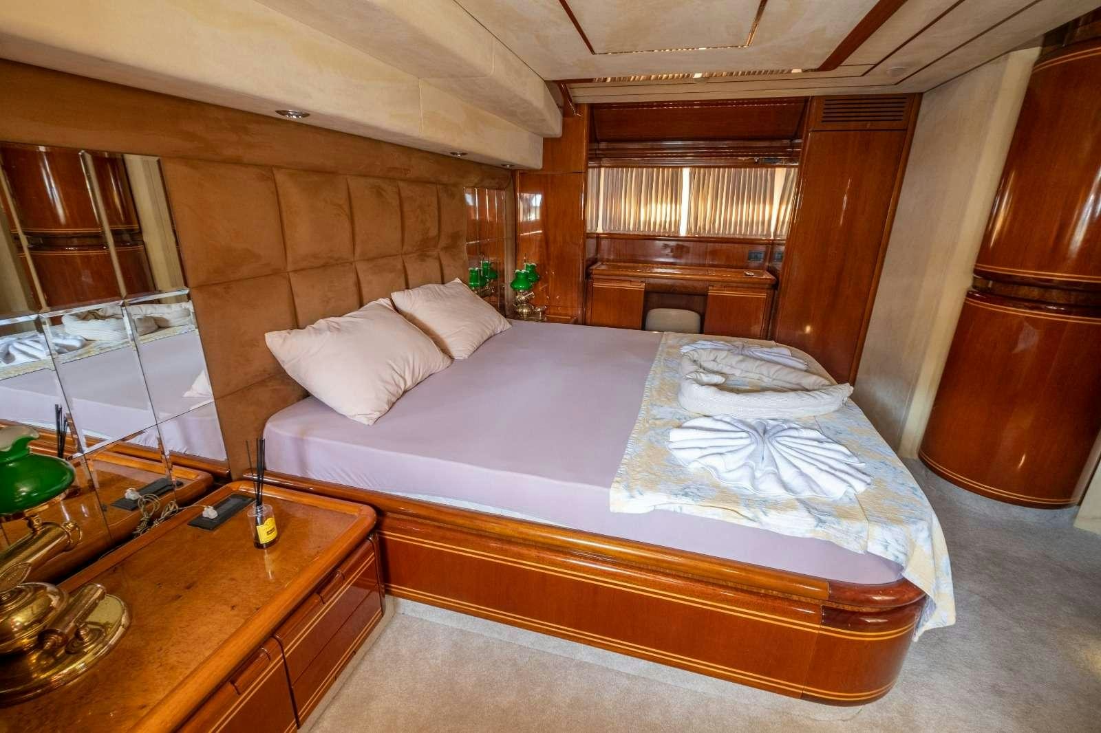a bed in a room aboard MIO AMORE Yacht for Charter