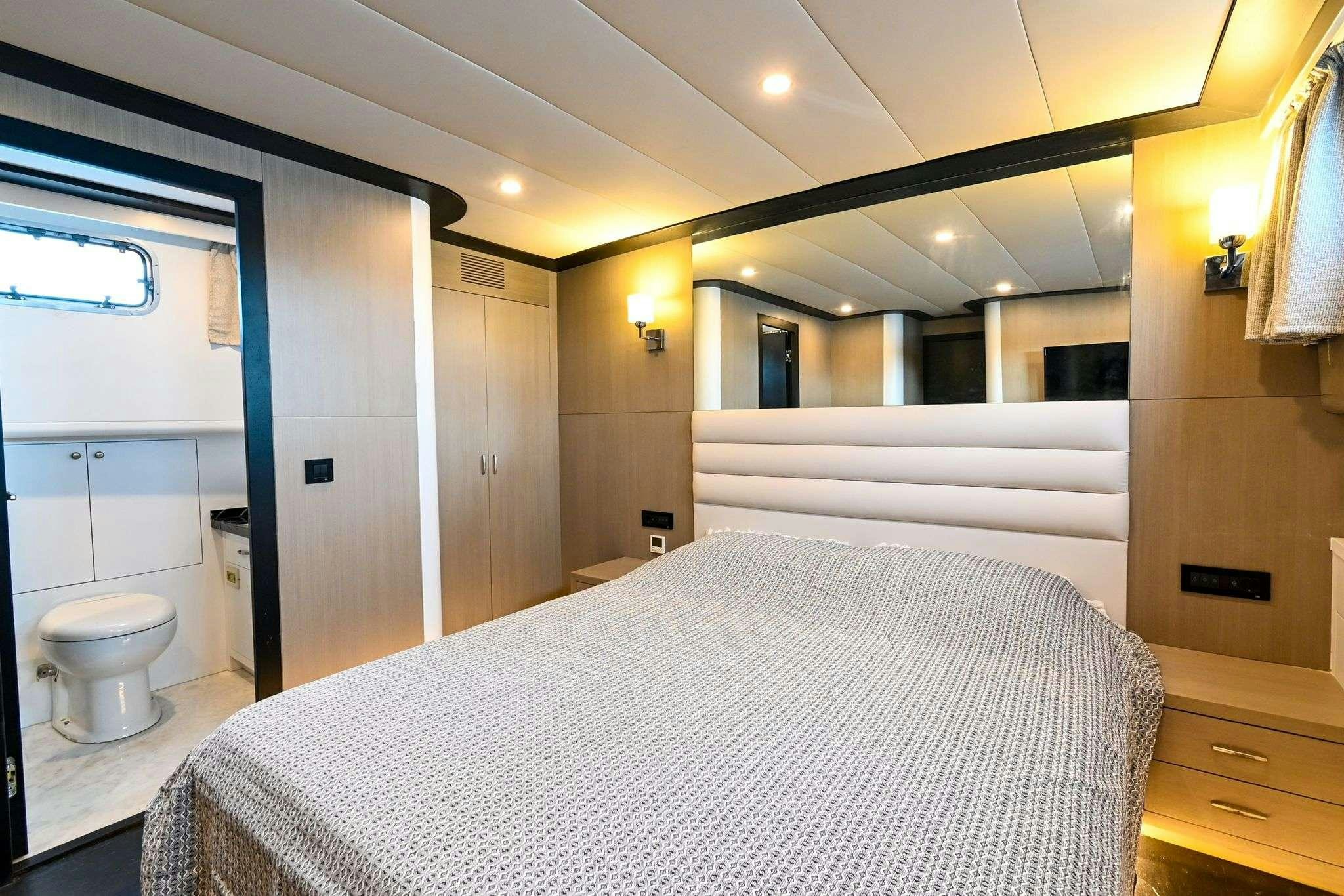 a large bathroom with a large bed aboard ESER 1 Yacht for Charter