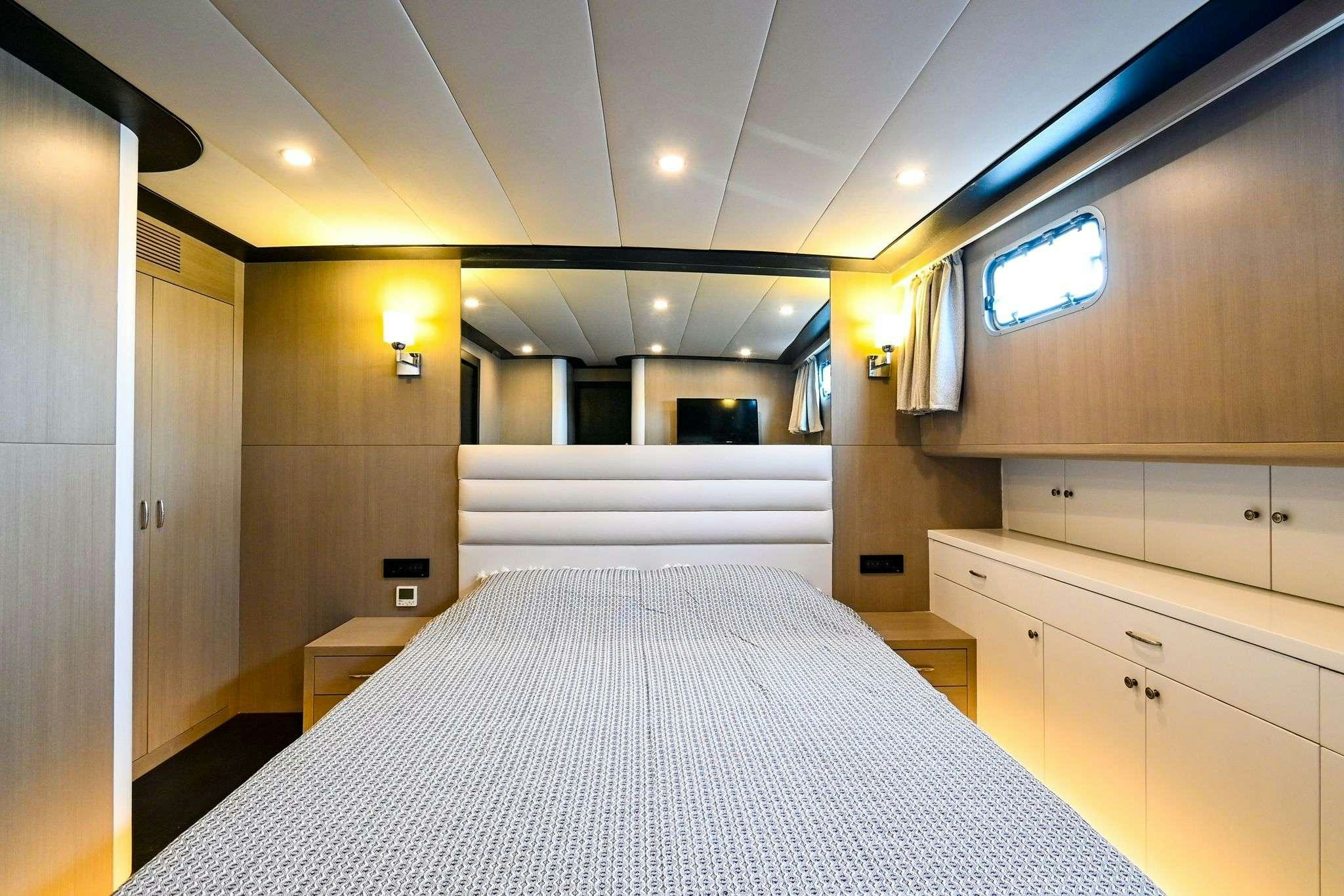 a bed in a room aboard ESER 1 Yacht for Charter