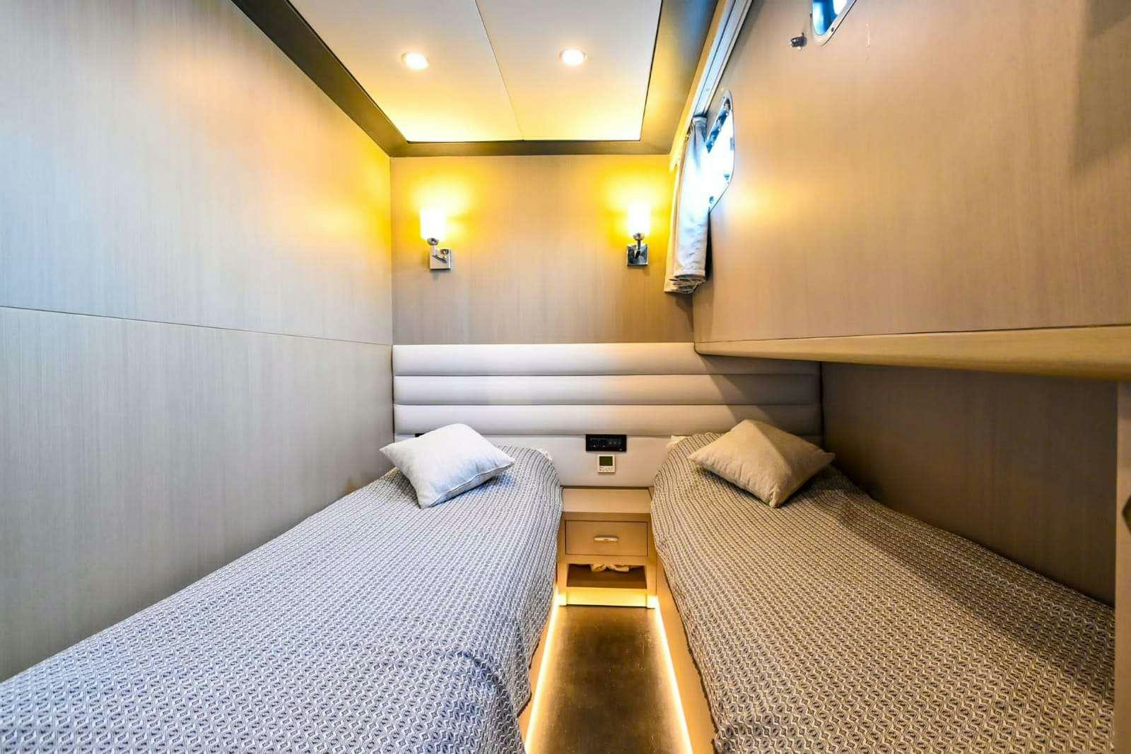 a room with two beds aboard ESER 1 Yacht for Charter