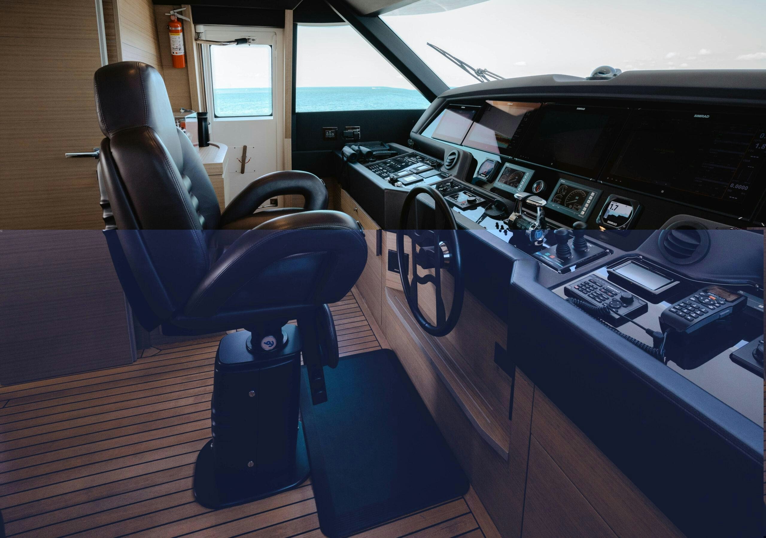 a desk with a computer and a chair aboard BONUS ROUND Yacht for Charter