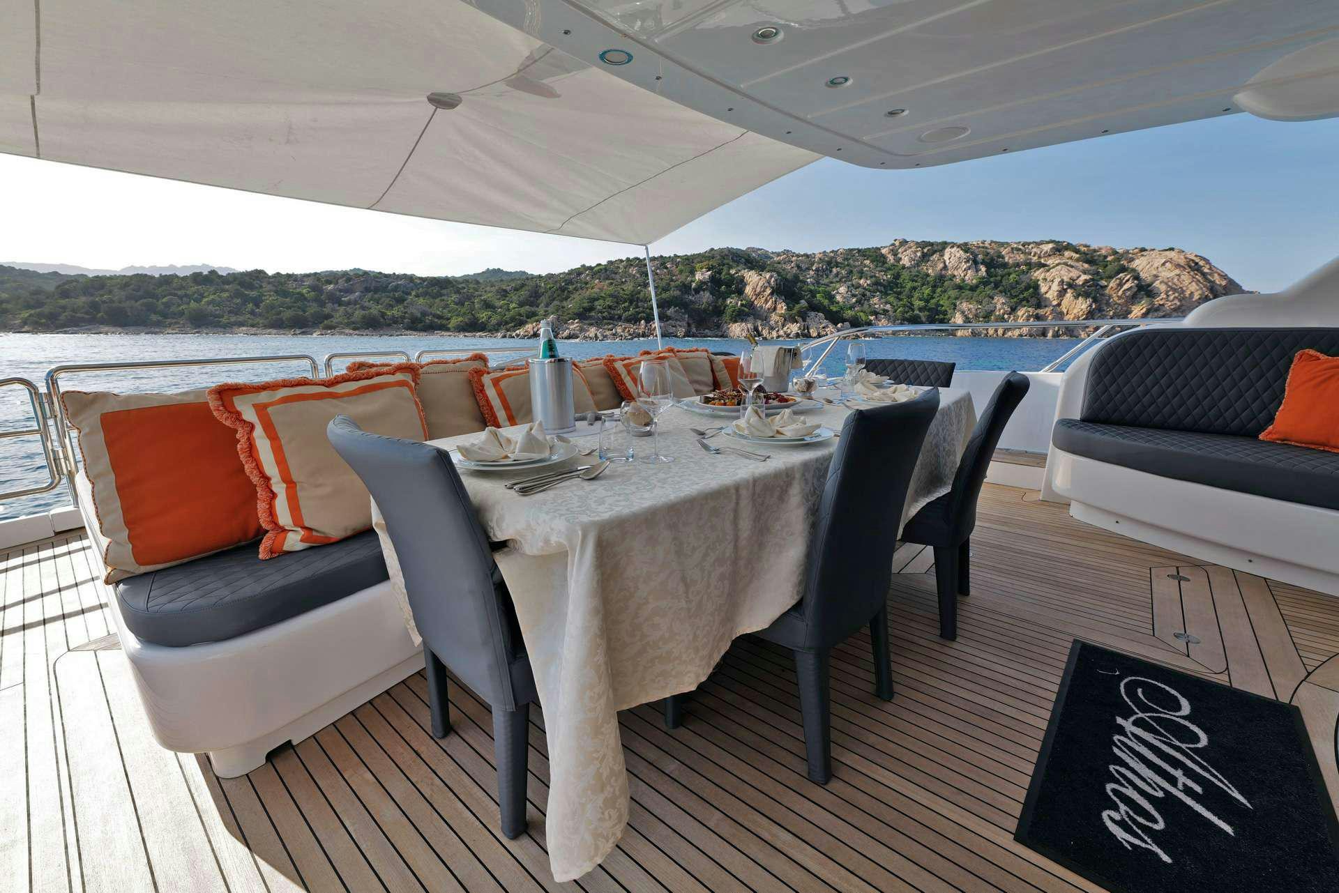 a table set for a meal aboard ATHOS Yacht for Charter