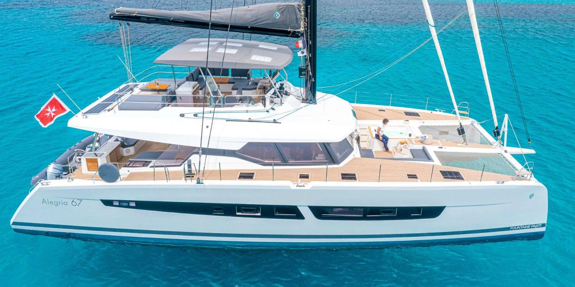 a white yacht on the water aboard SEMPER FIDELIS Yacht for Charter