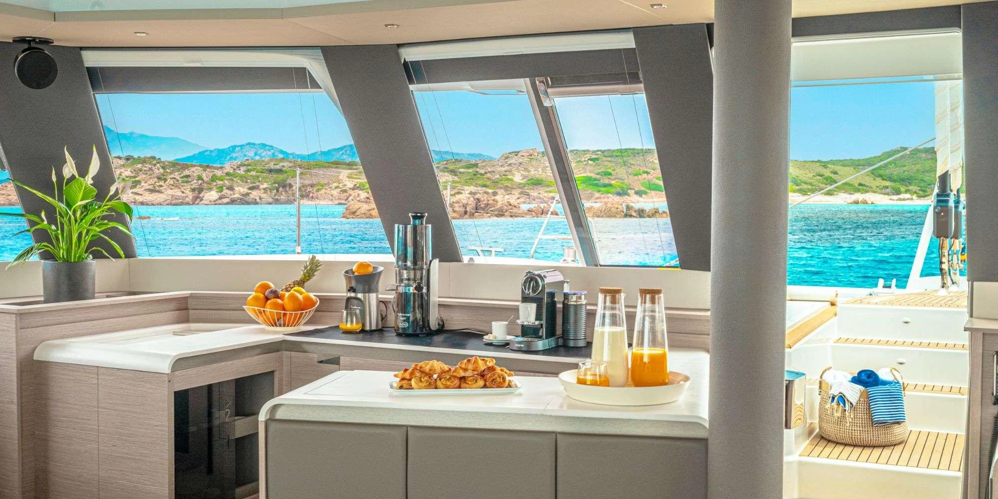 a kitchen with a view of the ocean aboard SEMPER FIDELIS Yacht for Charter