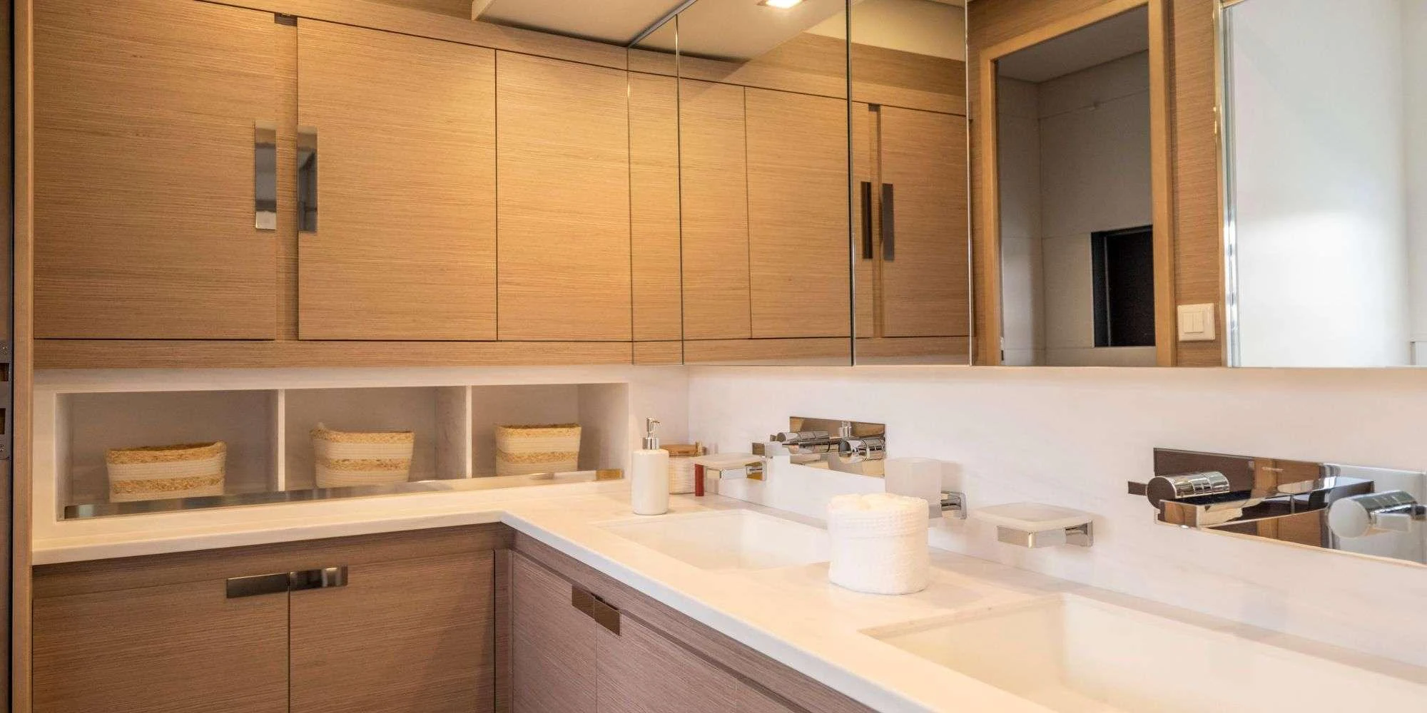 a kitchen with wooden cabinets aboard SEMPER FIDELIS Yacht for Charter