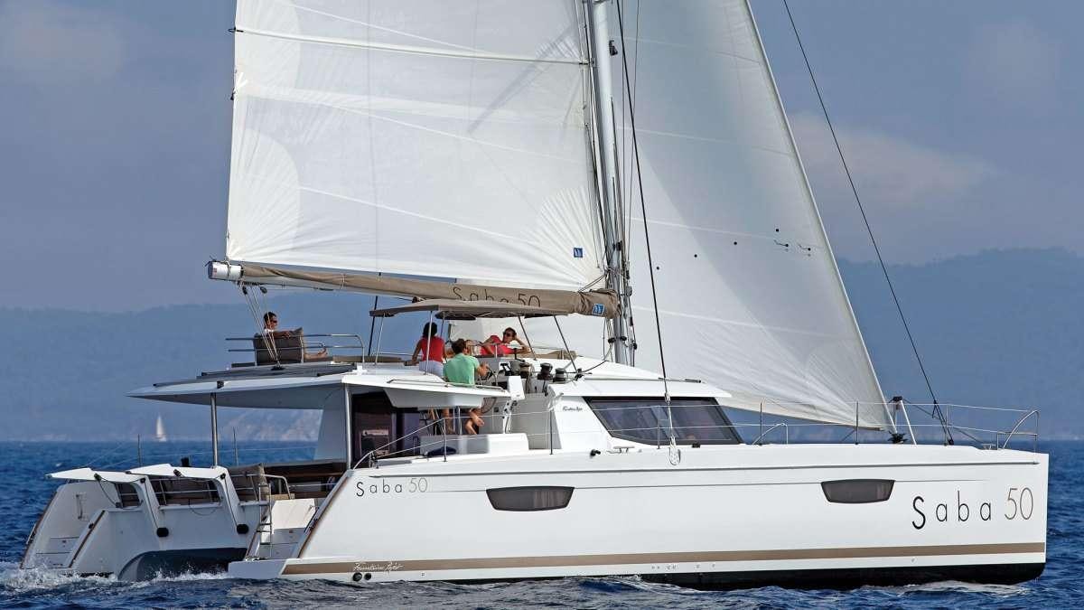 a boat with people on it aboard D&eacute;j&agrave; Vu Yacht for Charter