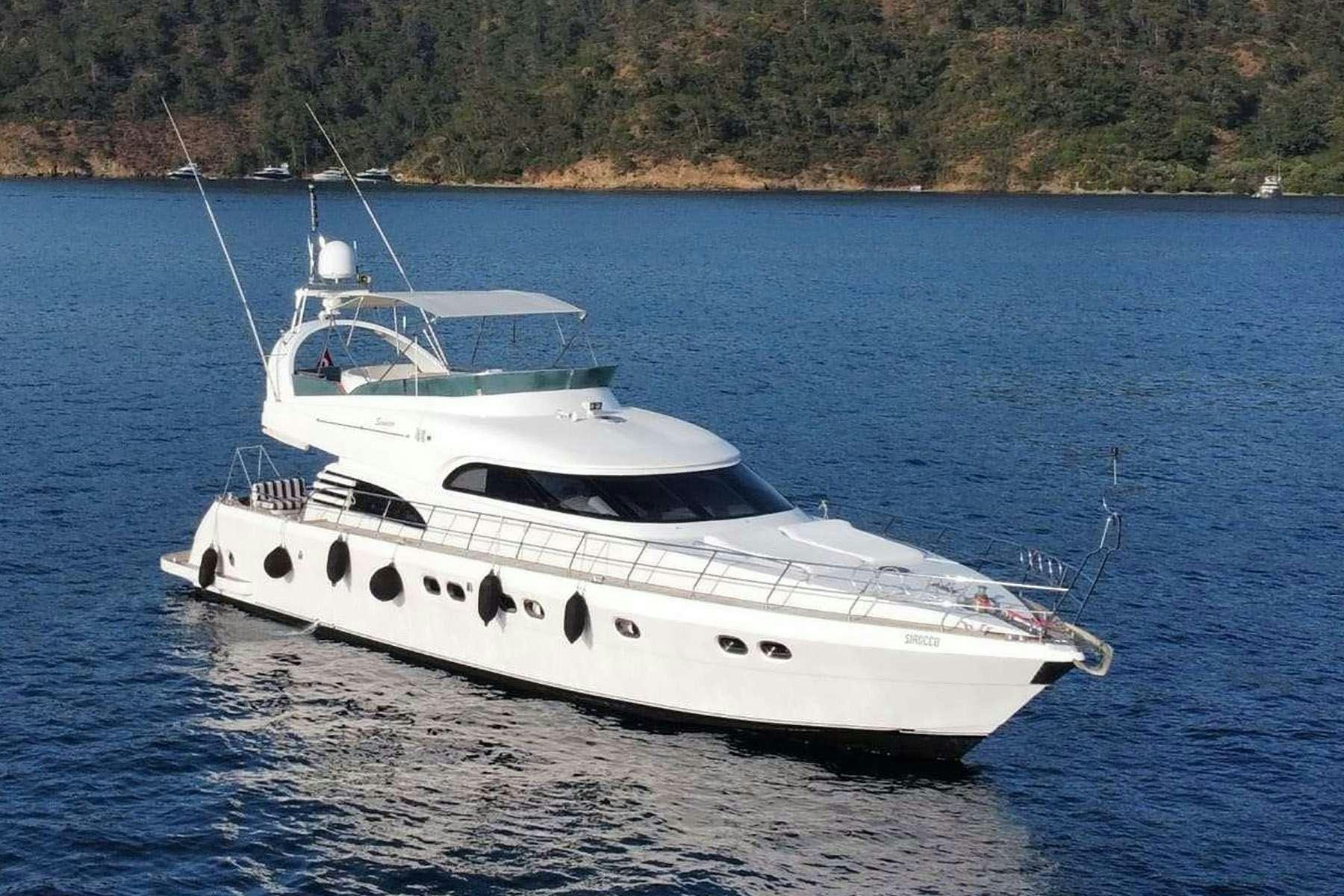a white yacht on the water aboard SIROCCO Yacht for Charter