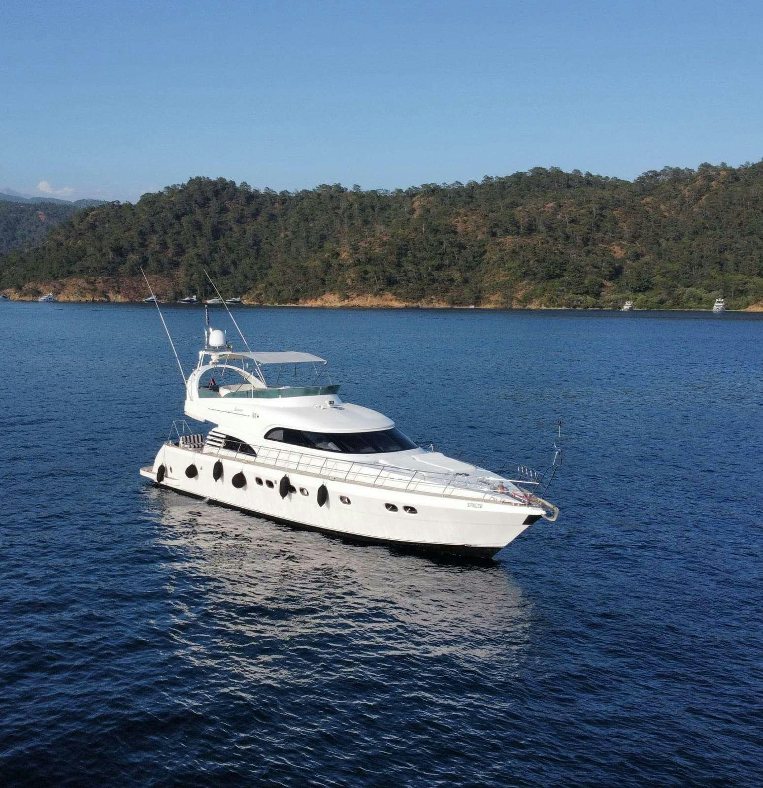 a white boat in the water aboard SIROCCO Yacht for Charter