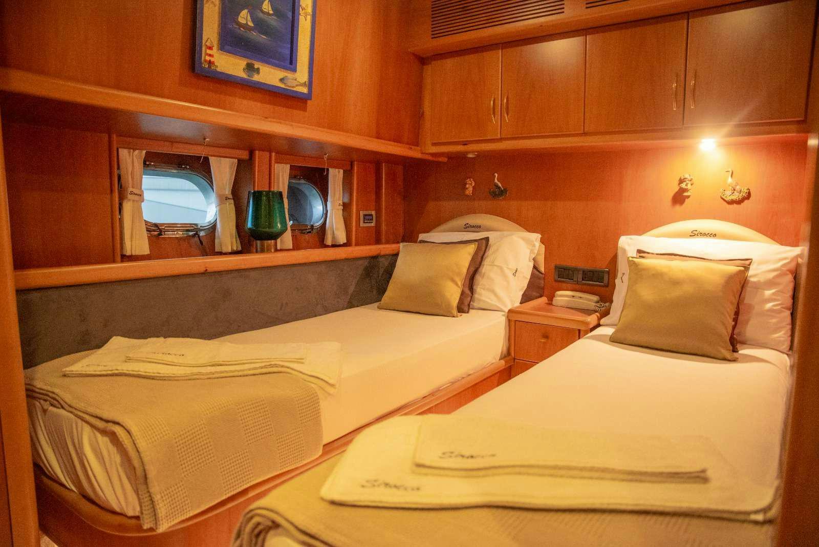 a room with two beds aboard SIROCCO Yacht for Charter