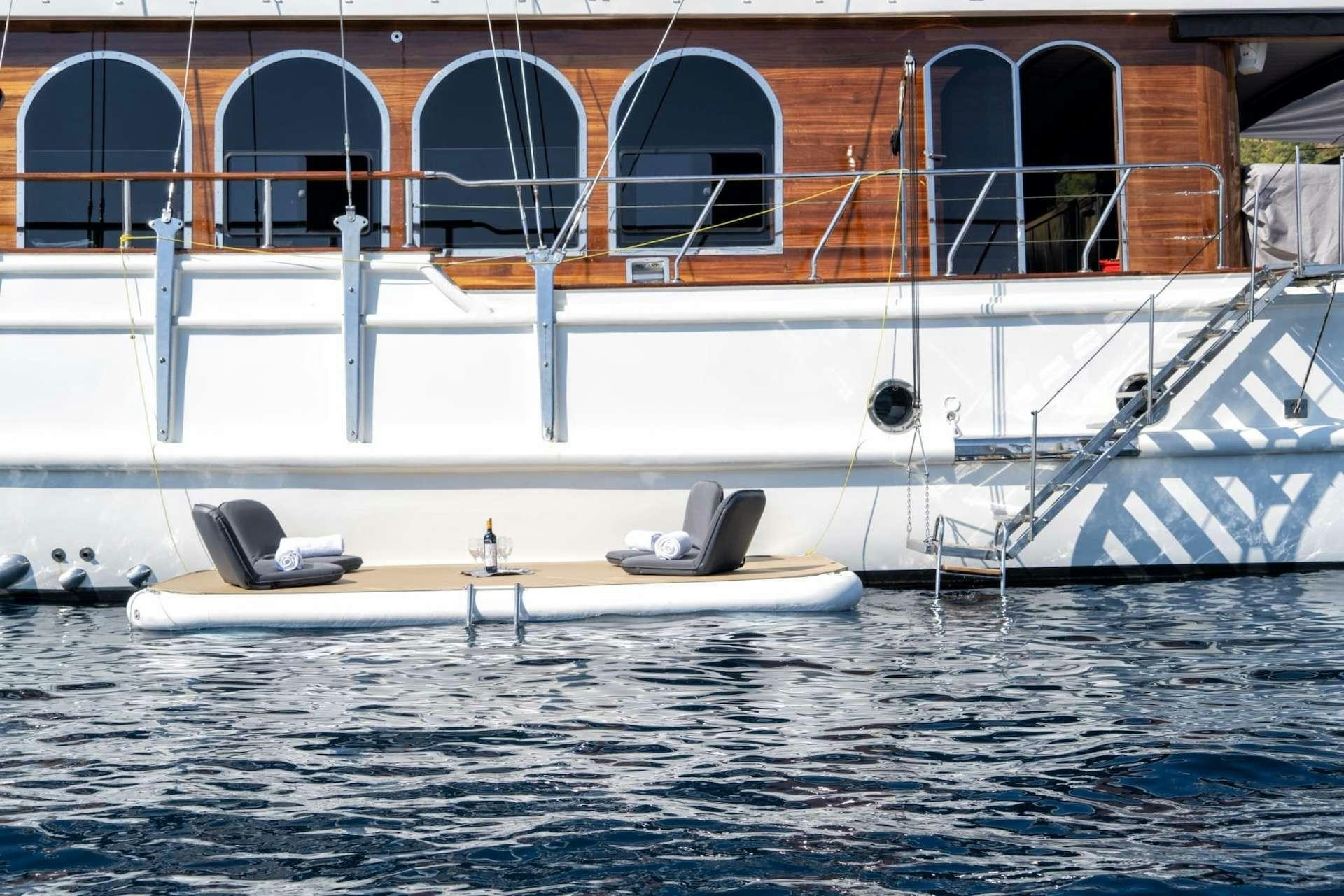 a boat on the water aboard CAUSTIC Yacht for Charter