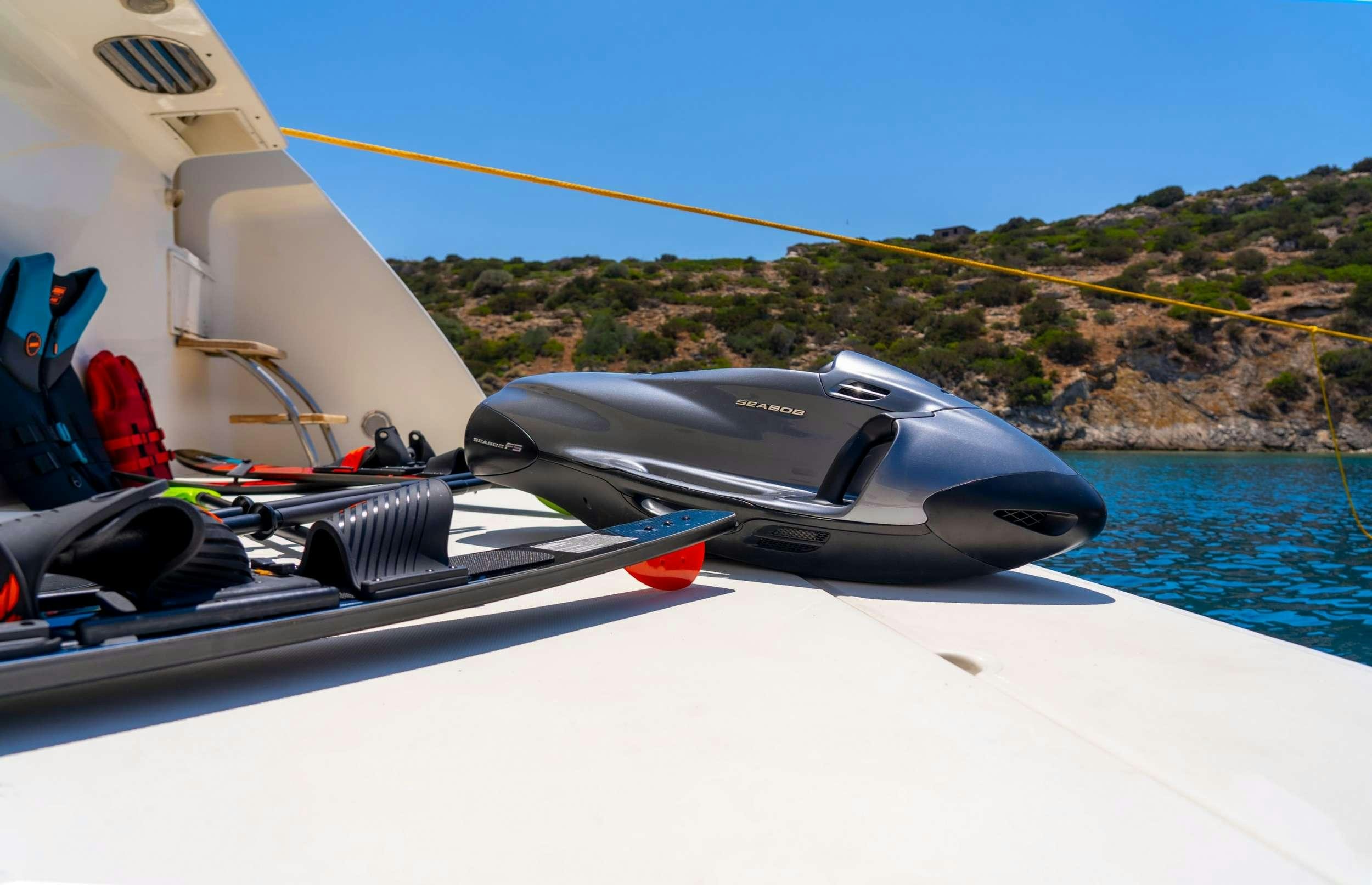 a black and silver boat on a lake aboard SOFIA D Yacht for Charter