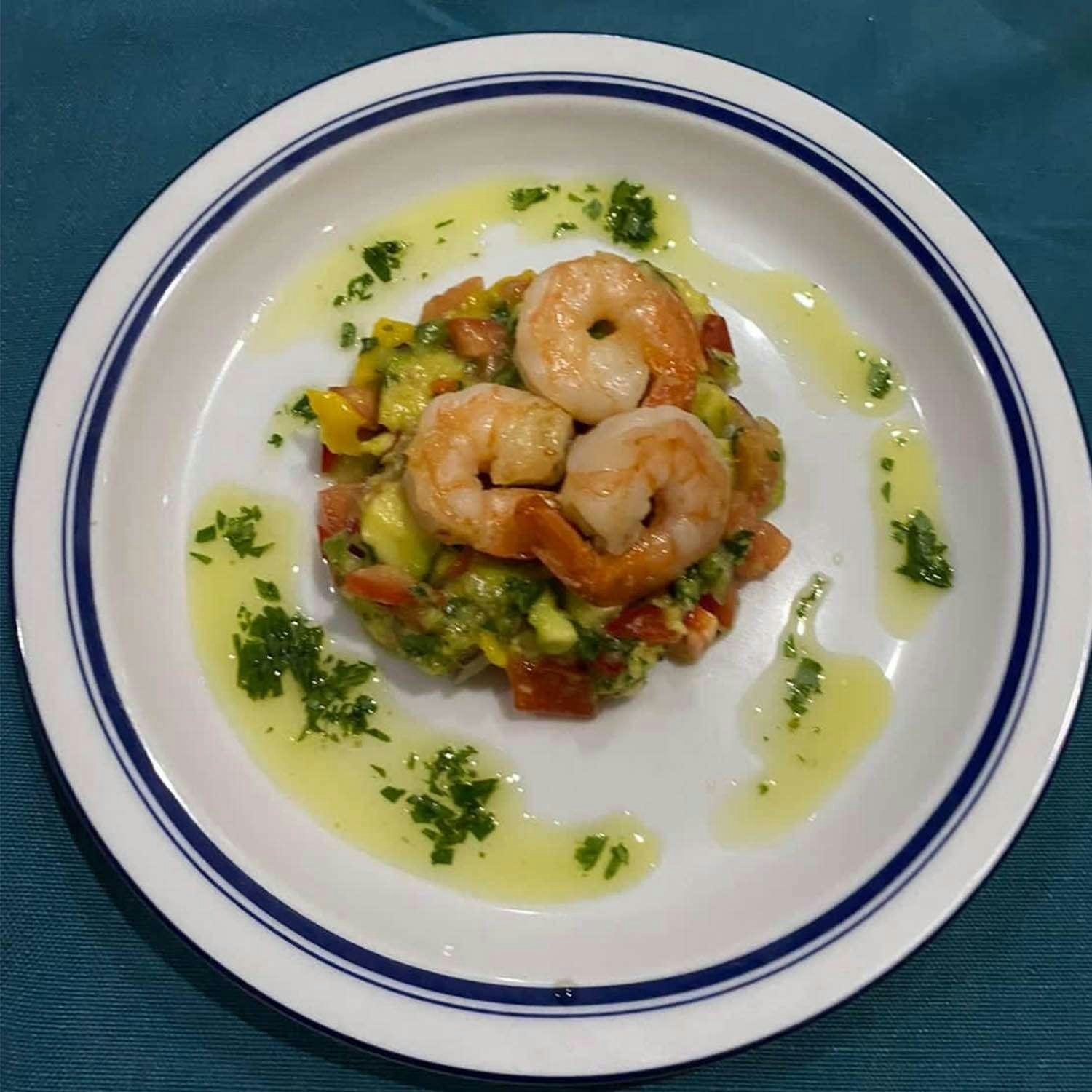 a plate of food aboard GO TEAM Yacht for Charter