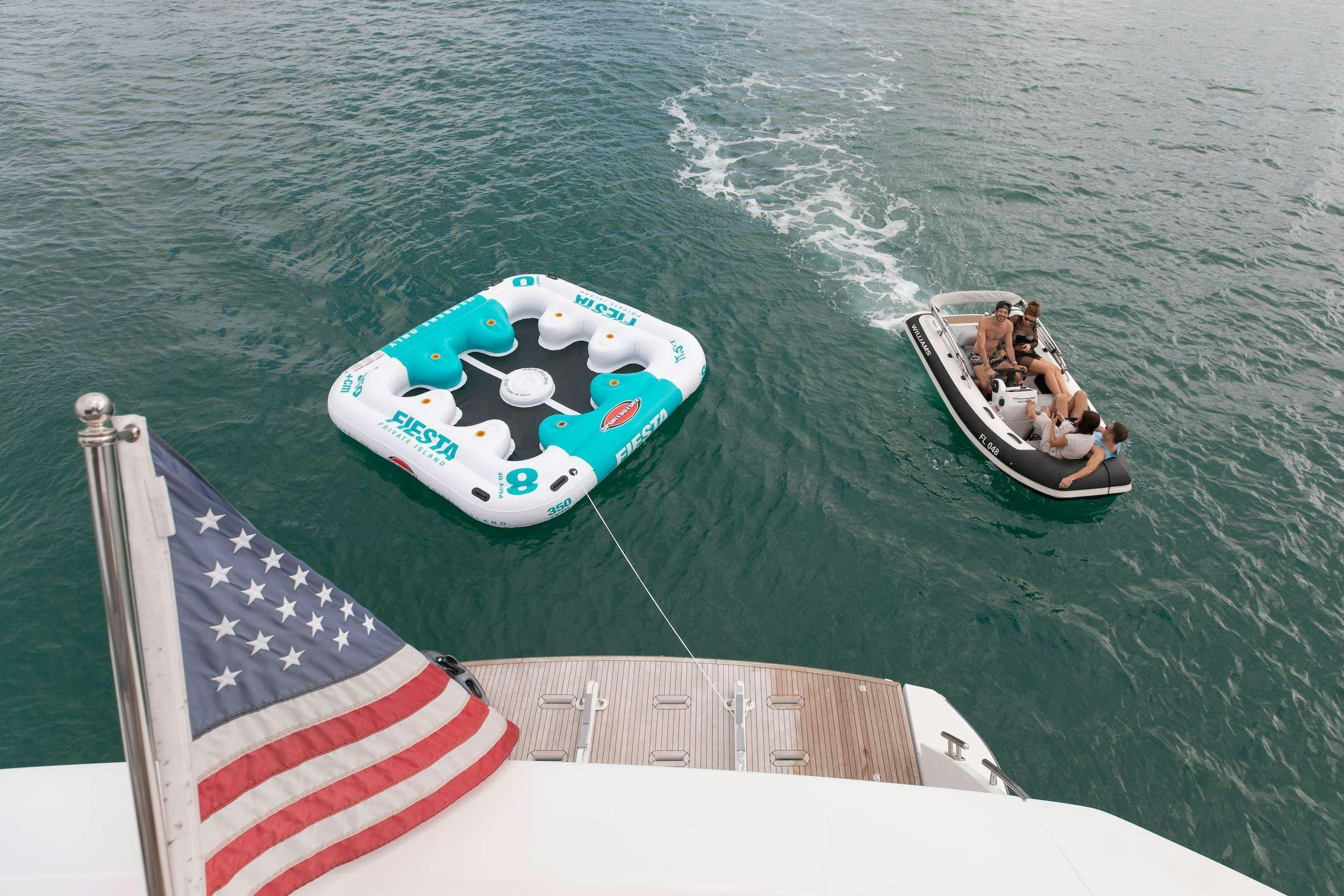 a couple people in a boat aboard NENA Yacht for Charter