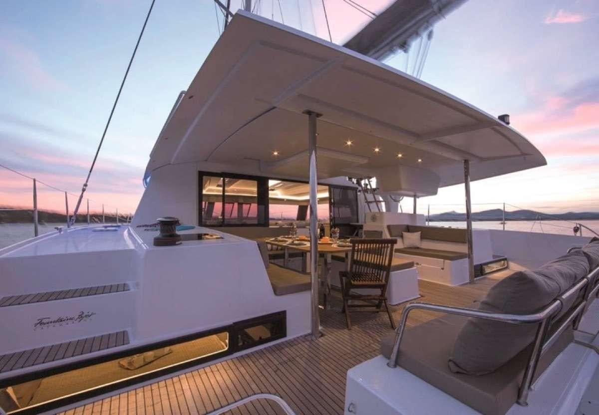 a boat on the water aboard Daydreams Yacht for Charter