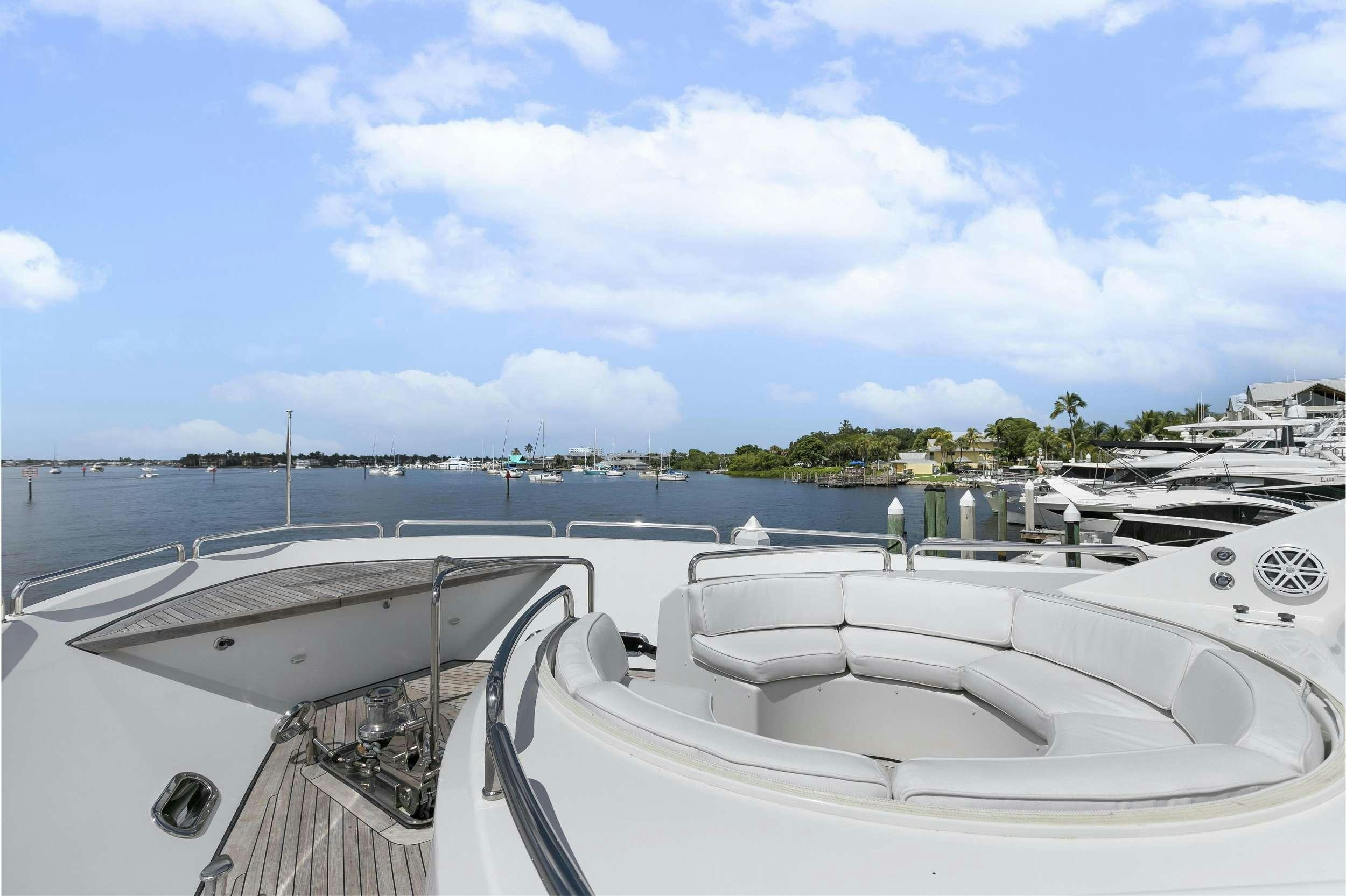 a boat with a person standing on the deck aboard EDEN Yacht for Charter