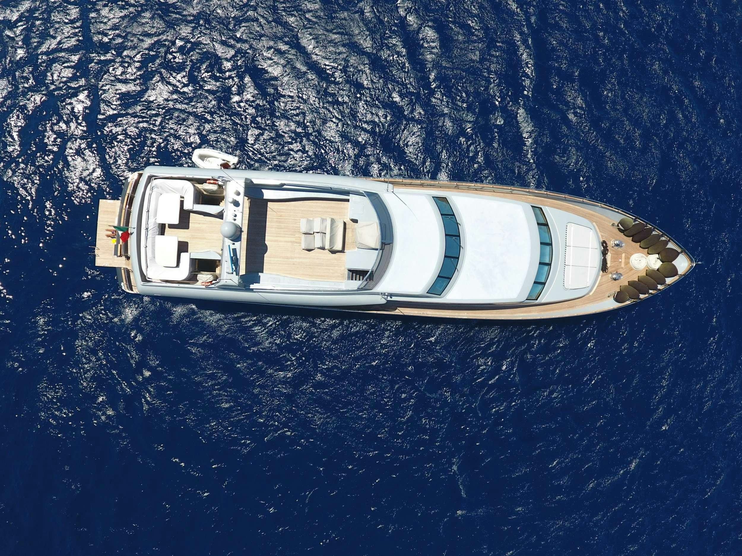 a white and blue logo on a blue background aboard SATORI Yacht for Charter
