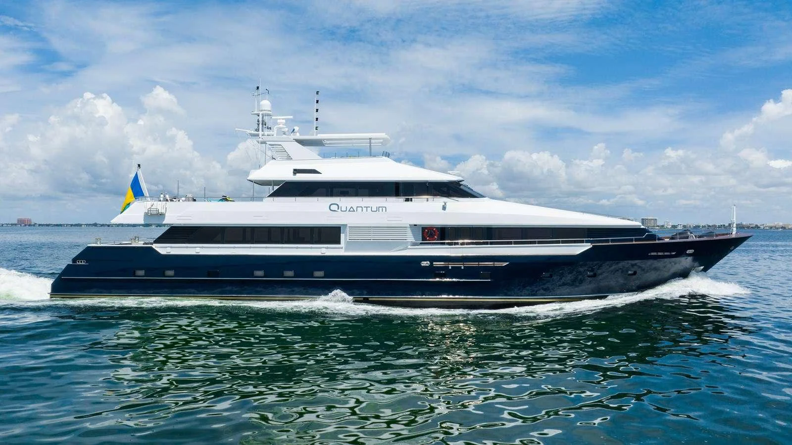 a large boat on the water aboard QUANTUM Yacht for Charter