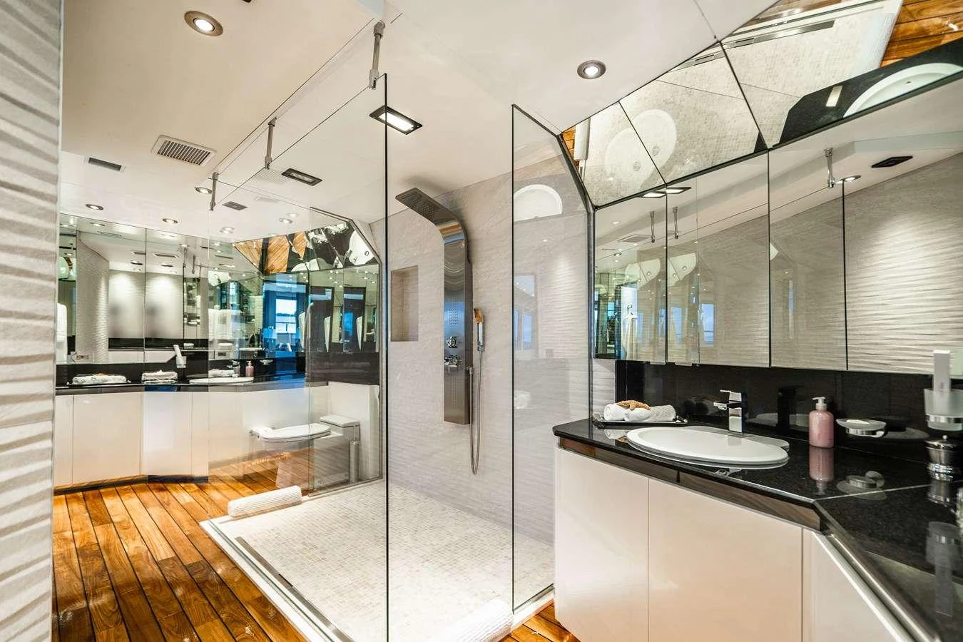 a kitchen with a glass wall aboard QUANTUM Yacht for Charter