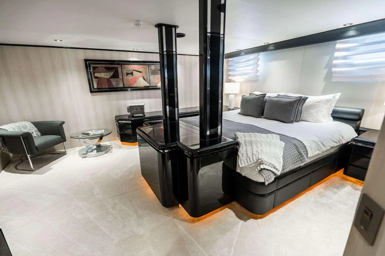a bed in a room aboard QUANTUM Yacht for Charter