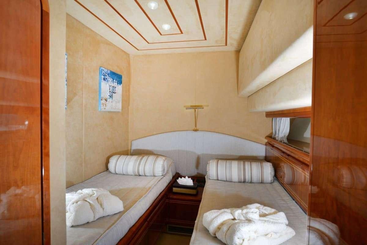 a couple of beds in a room aboard KENTAVROS II Yacht for Charter
