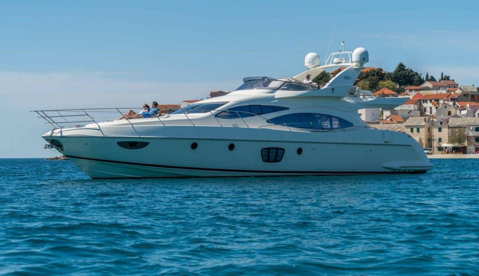 a white yacht on the water aboard SEA LA VIE Yacht for Charter