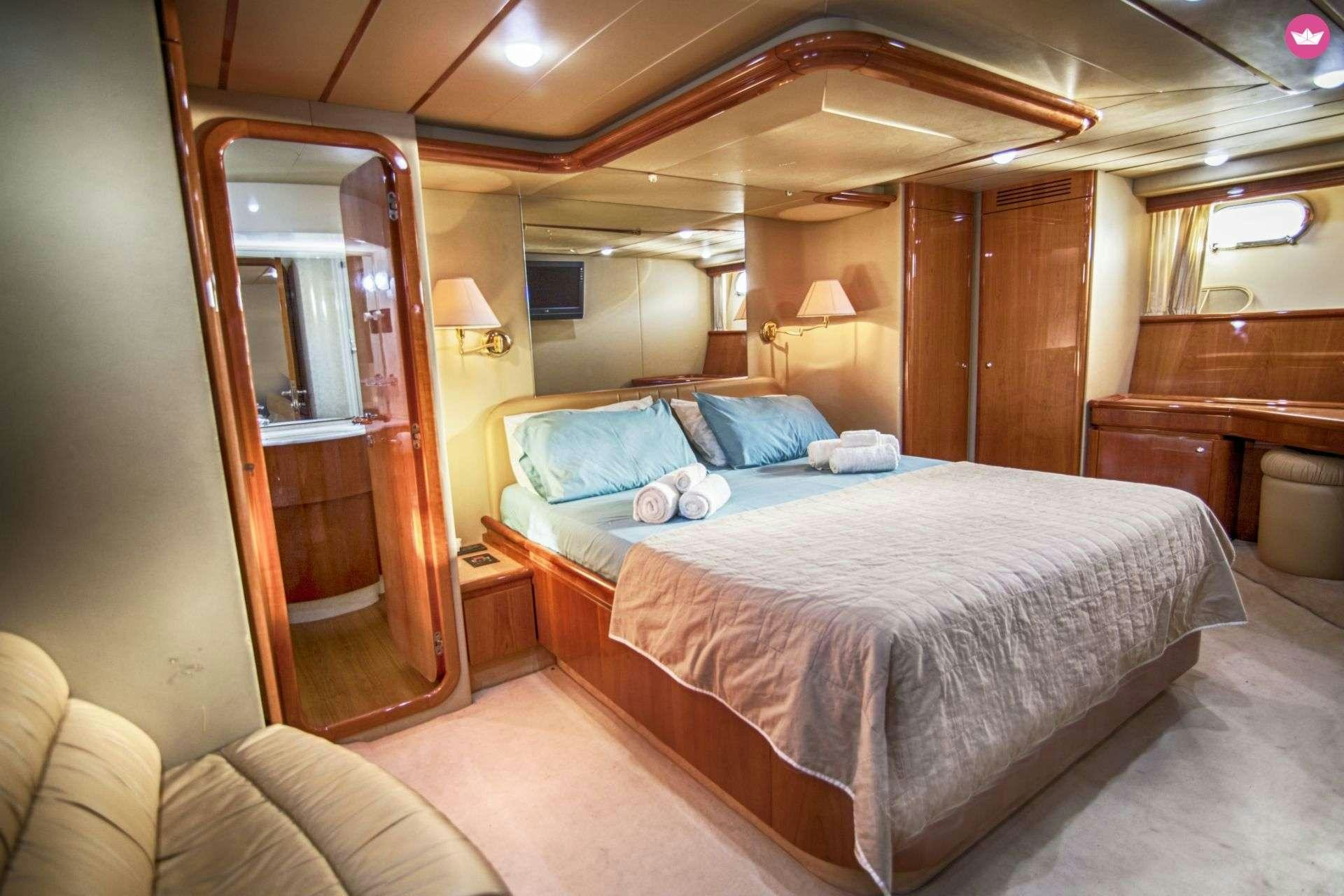 a bed in a room aboard SERENE Yacht for Charter