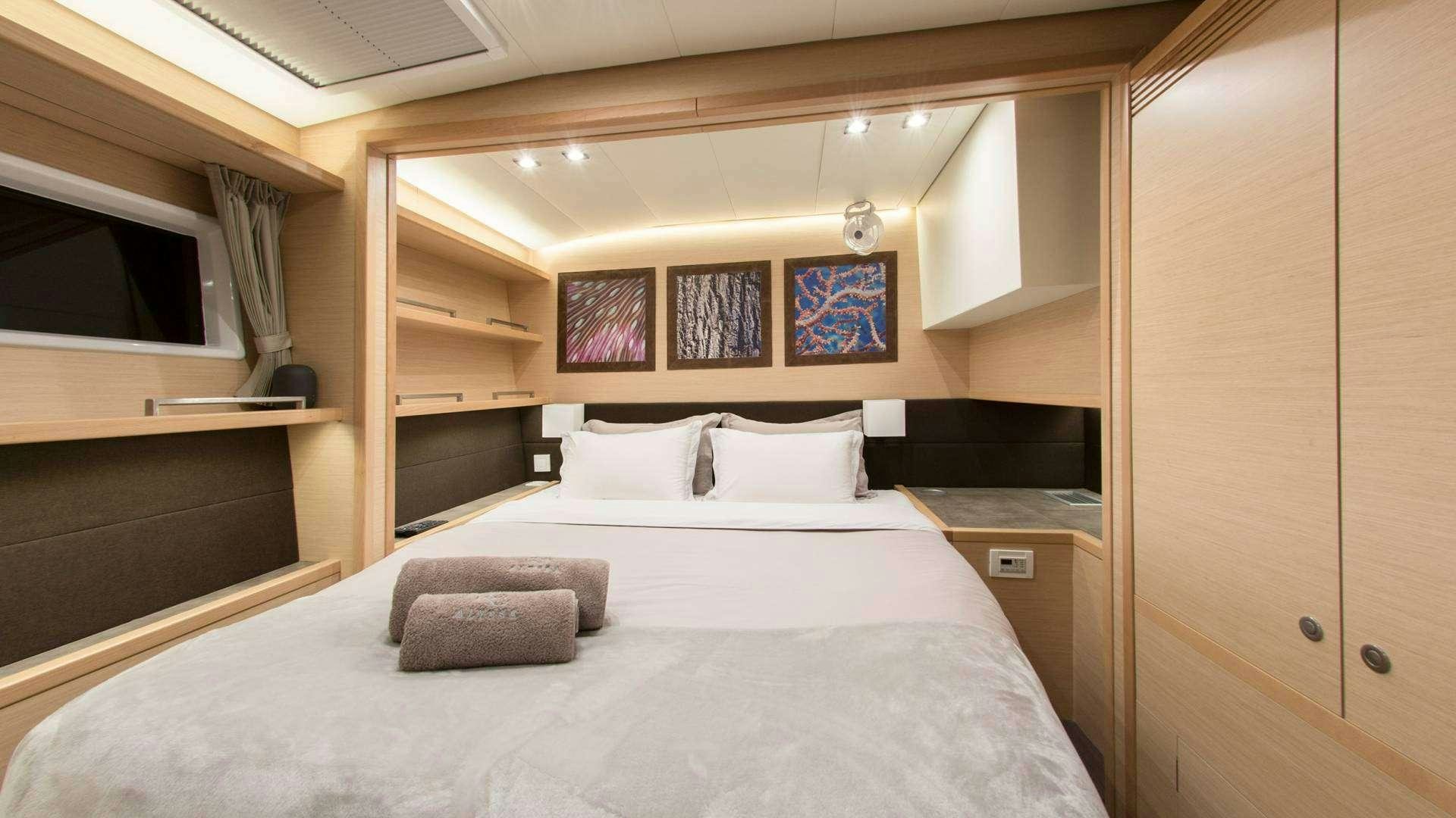 a bed in a room aboard Alyssa Yacht for Charter