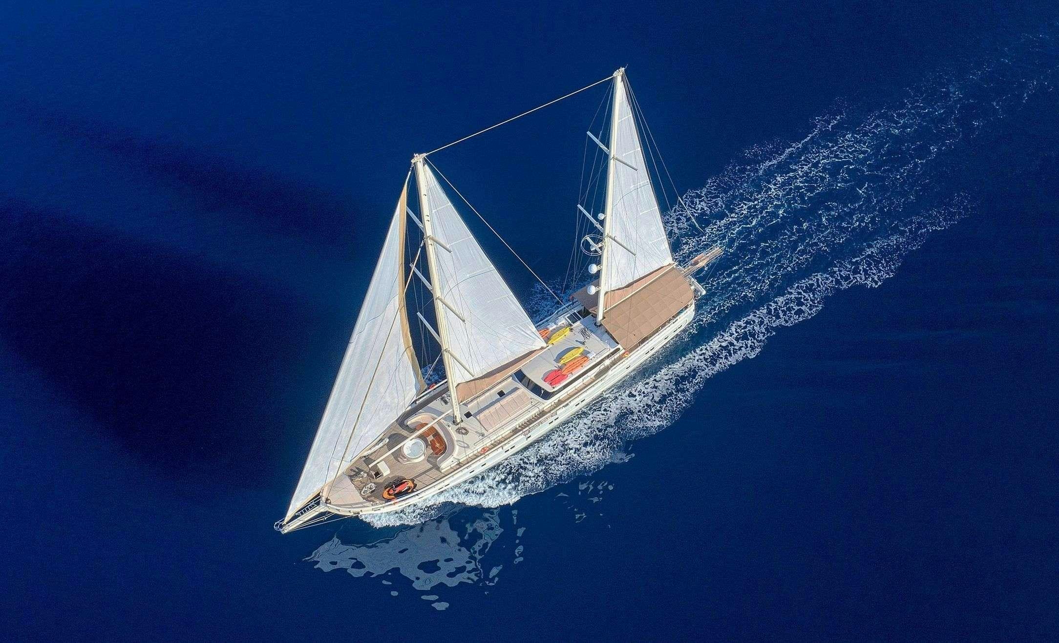 a ship in the water aboard QUEEN OF SALMAKIS Yacht for Charter