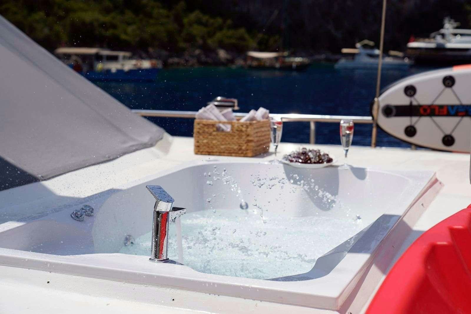 a boat with a basket on the front aboard QUEEN OF MAKRI Yacht for Charter