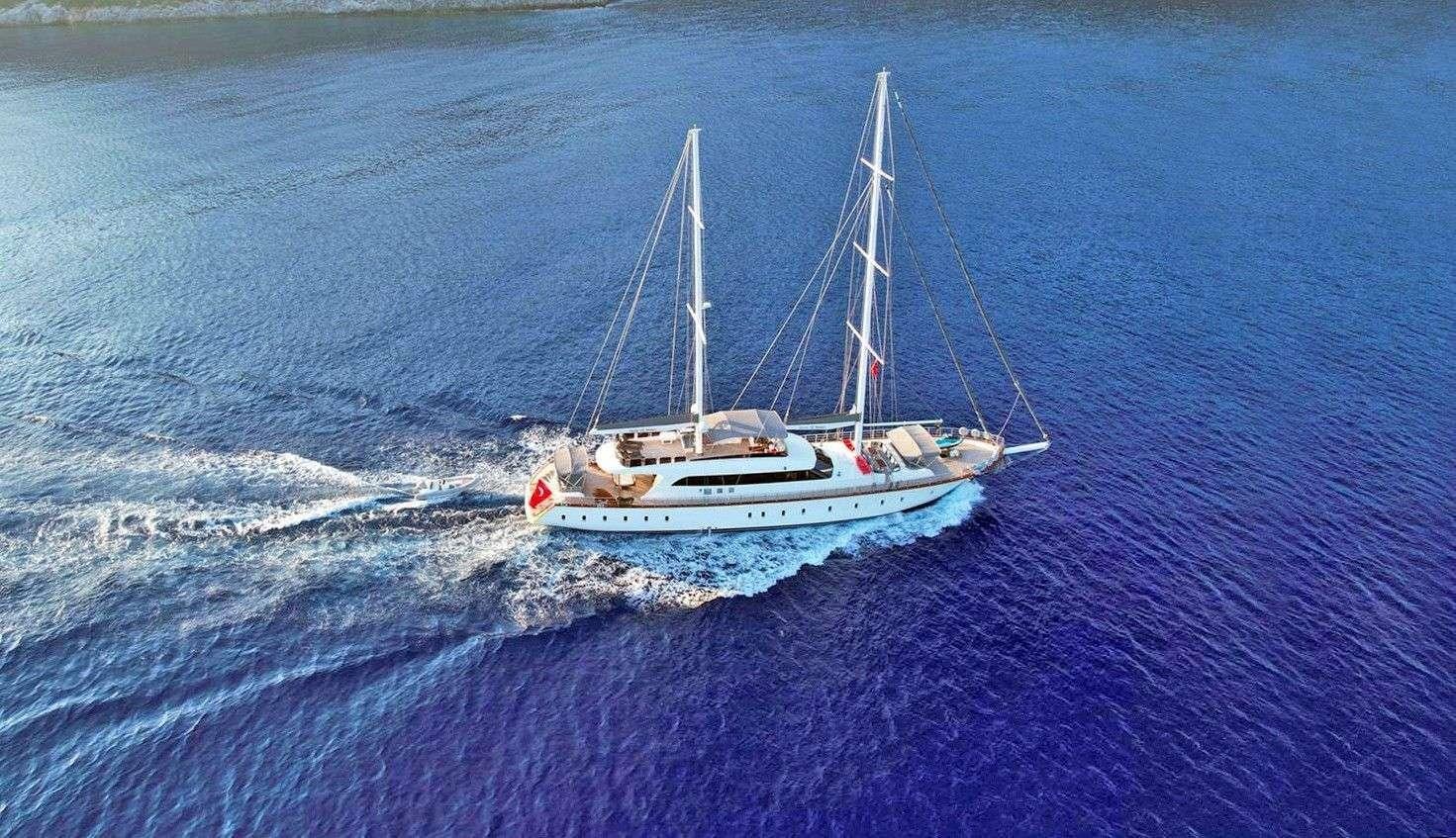 a boat sailing on the sea aboard QUEEN OF MAKRI Yacht for Charter