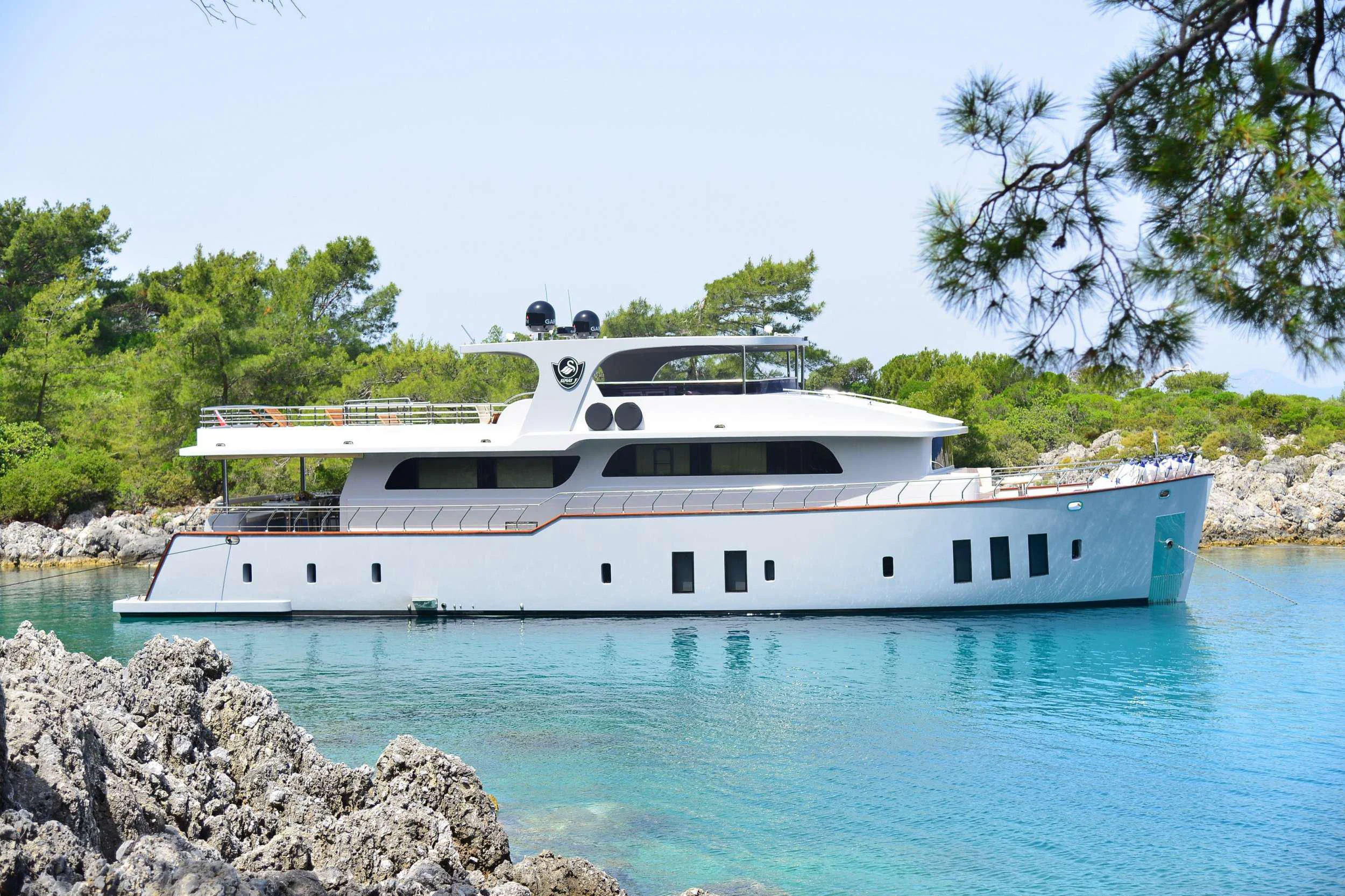 a boat on the water aboard IMMERSIVE Yacht for Charter