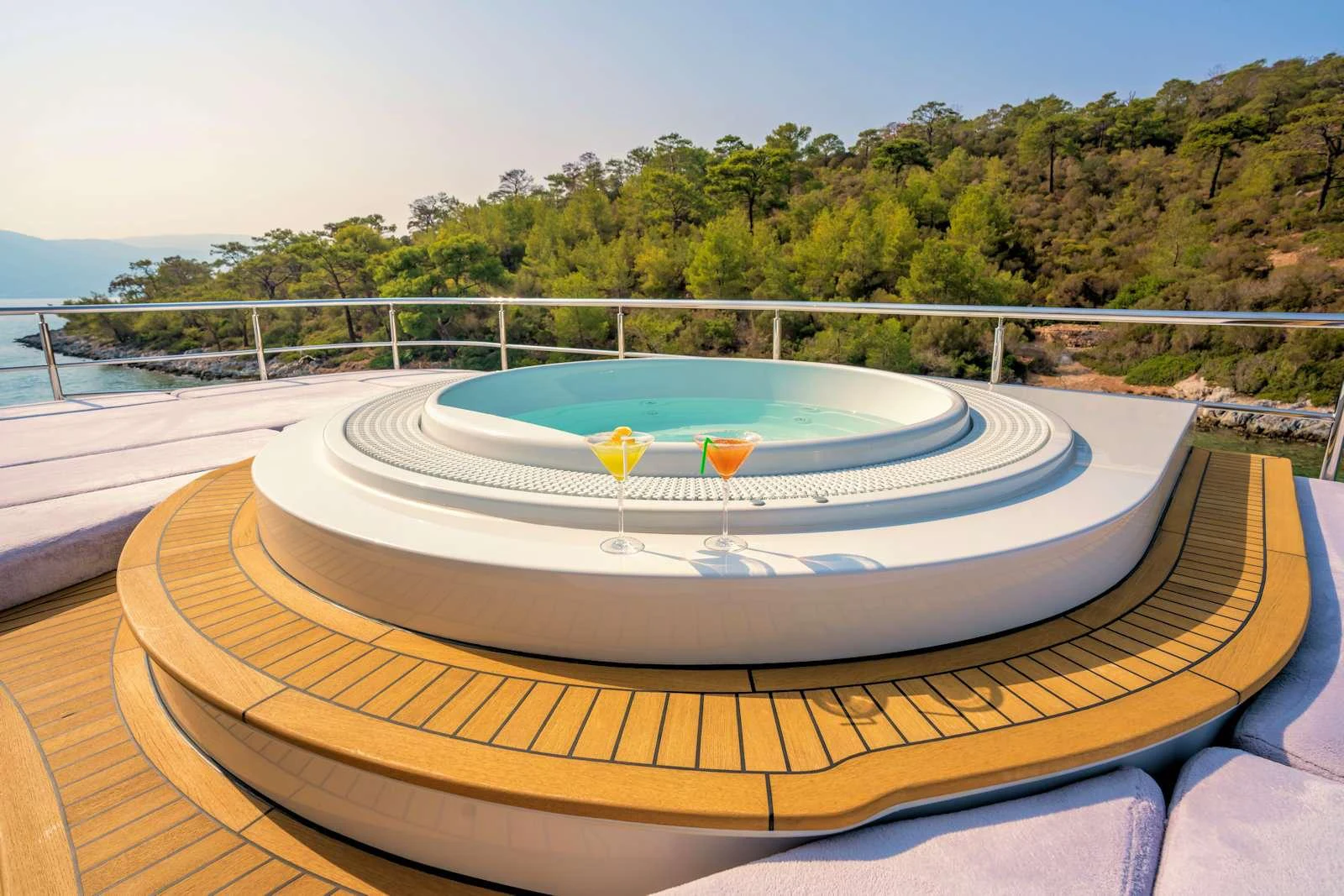 a water fountain with a water slide aboard IMMERSIVE Yacht for Charter