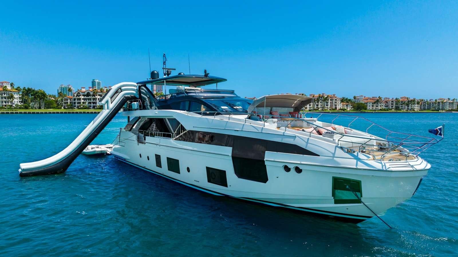 a white yacht on the water aboard RINA Yacht for Charter
