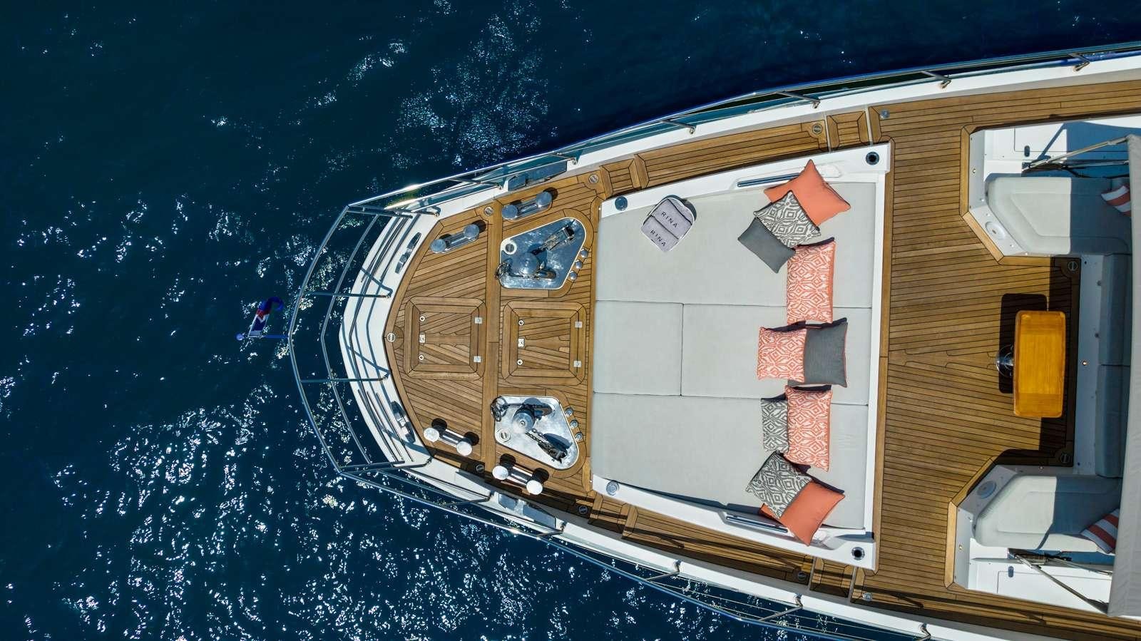 a house with a yard and a yard in the yard aboard RINA Yacht for Charter