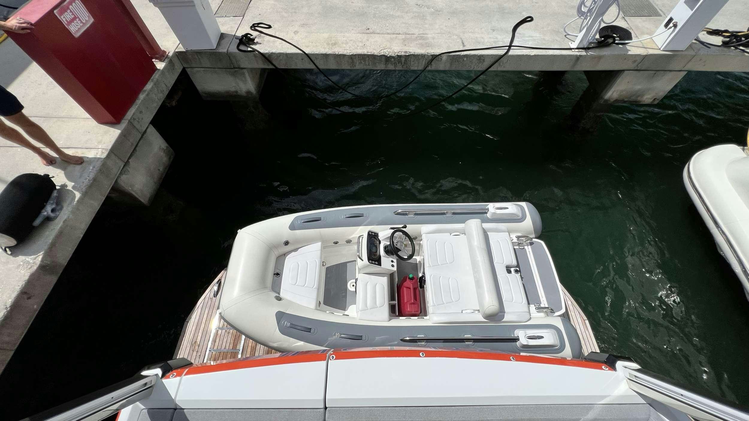 a white boat with wires attached to it aboard CRYPTO LIFE Yacht for Charter