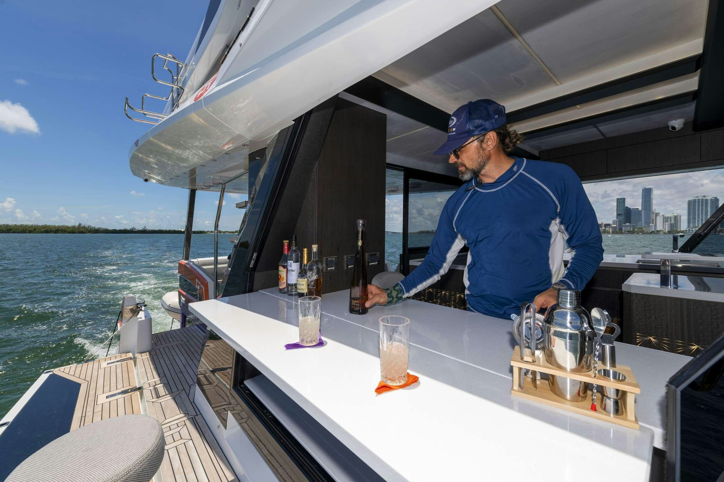 a man on a boat aboard CRYPTO LIFE Yacht for Charter