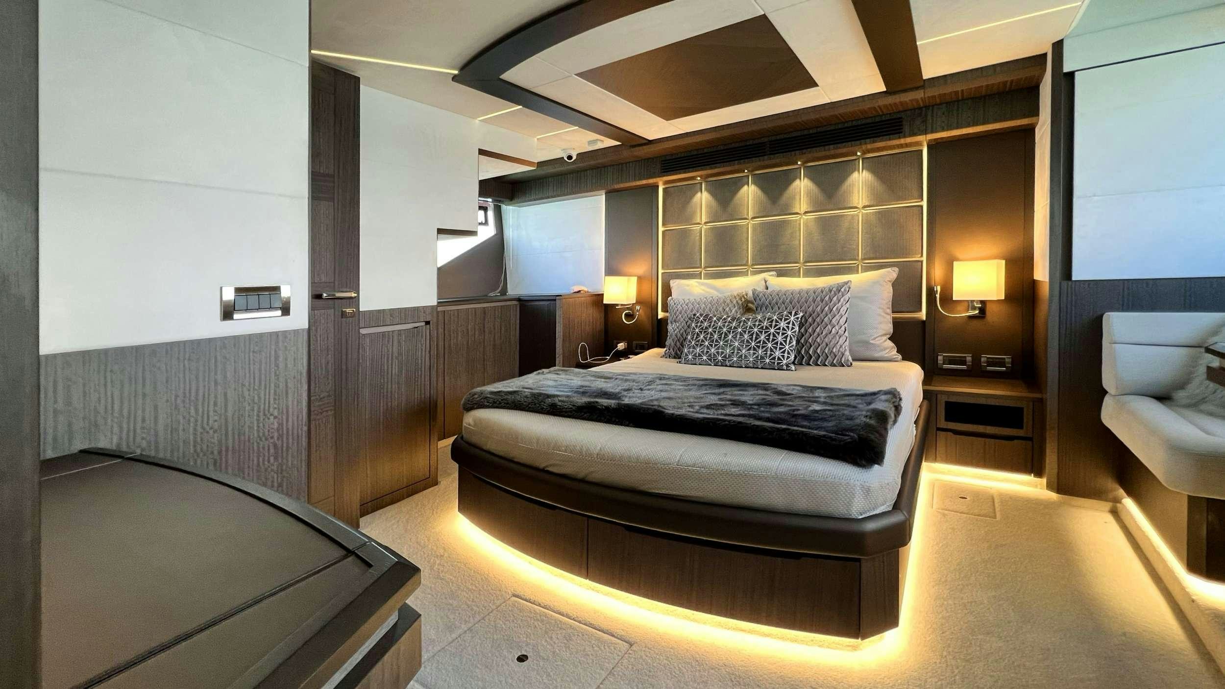 a large bed in a room aboard CRYPTO LIFE Yacht for Charter