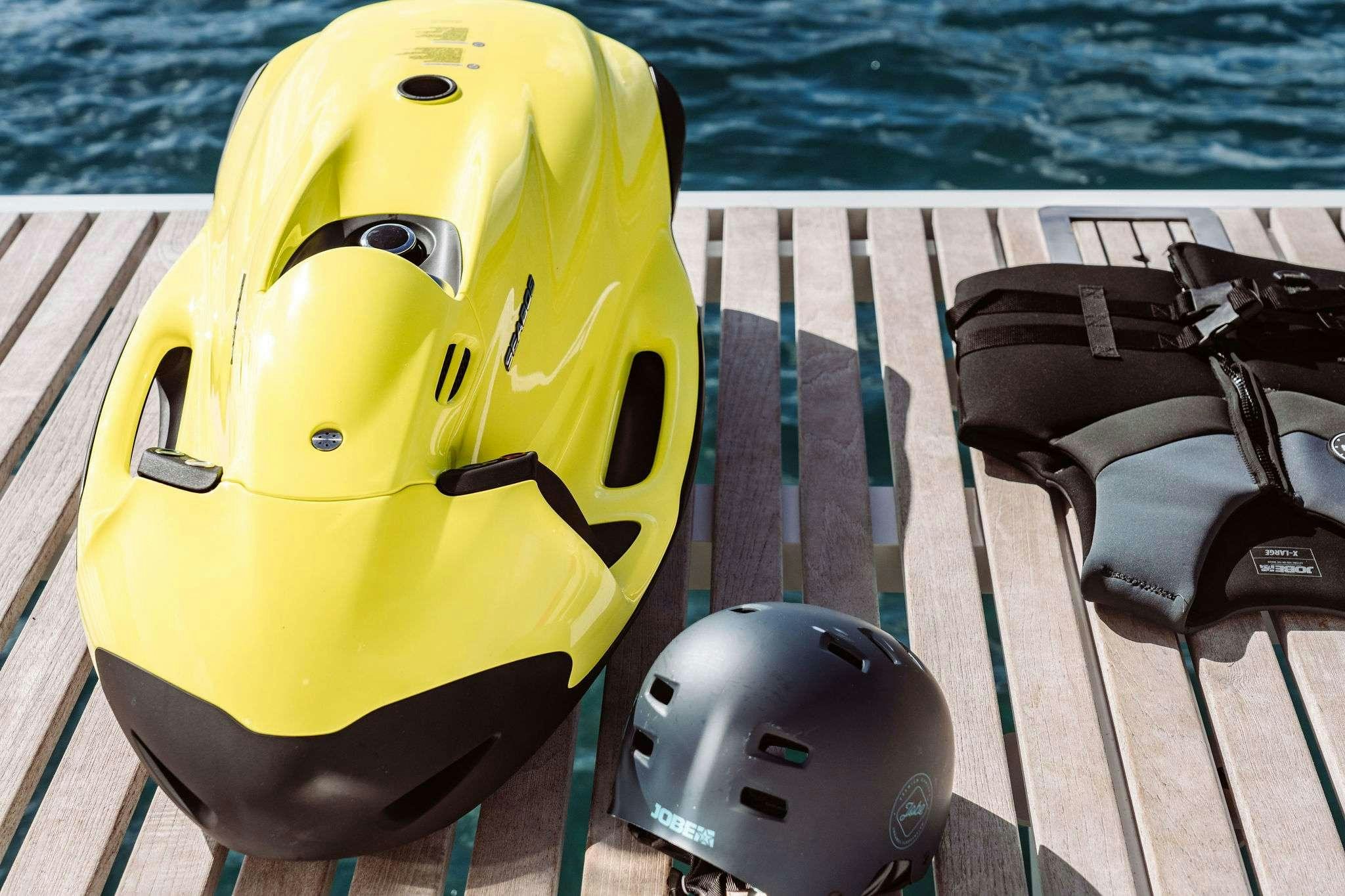 a yellow lifeguard on a boat aboard OCEANUS Yacht for Charter