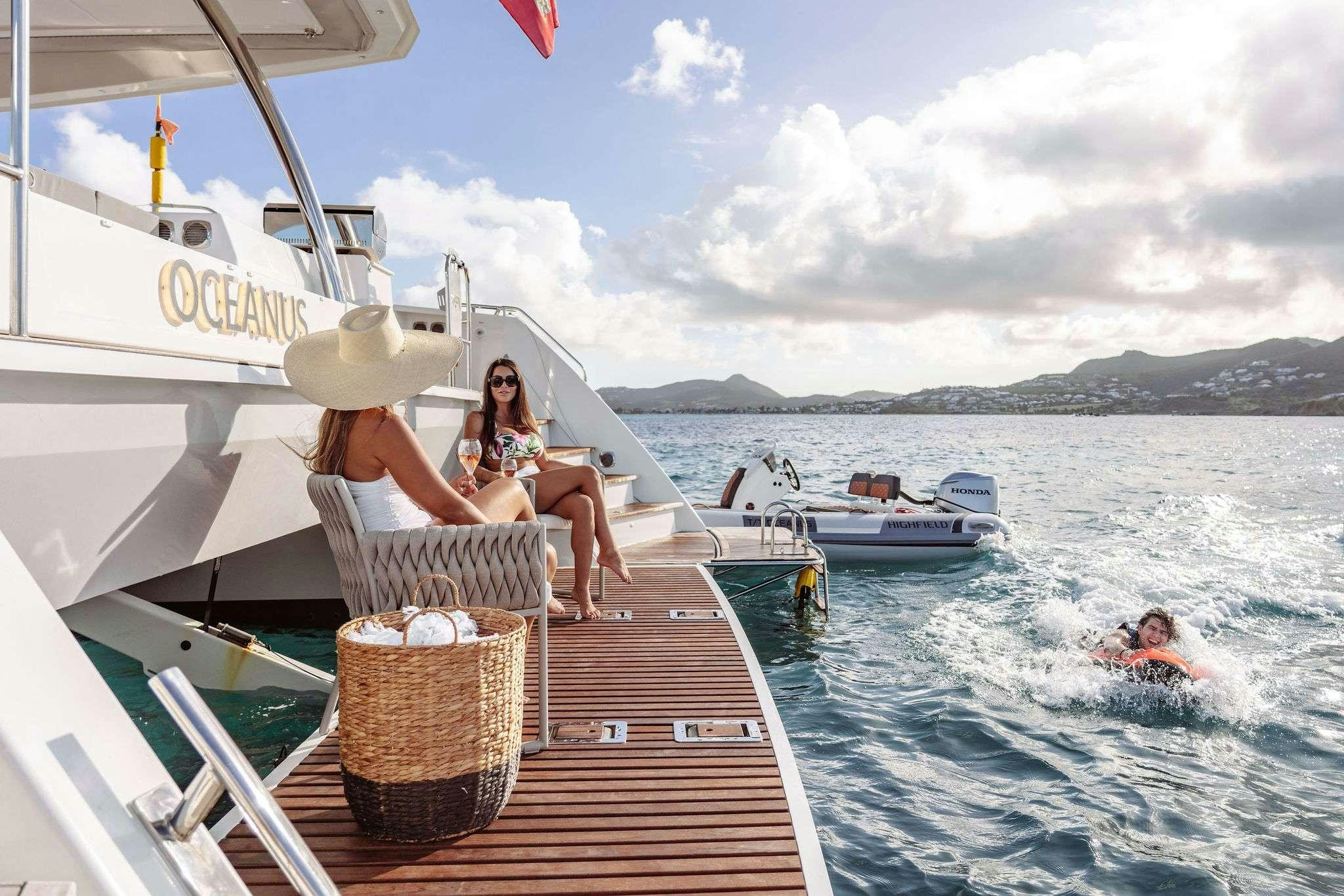 a person sitting on a boat aboard OCEANUS Yacht for Charter