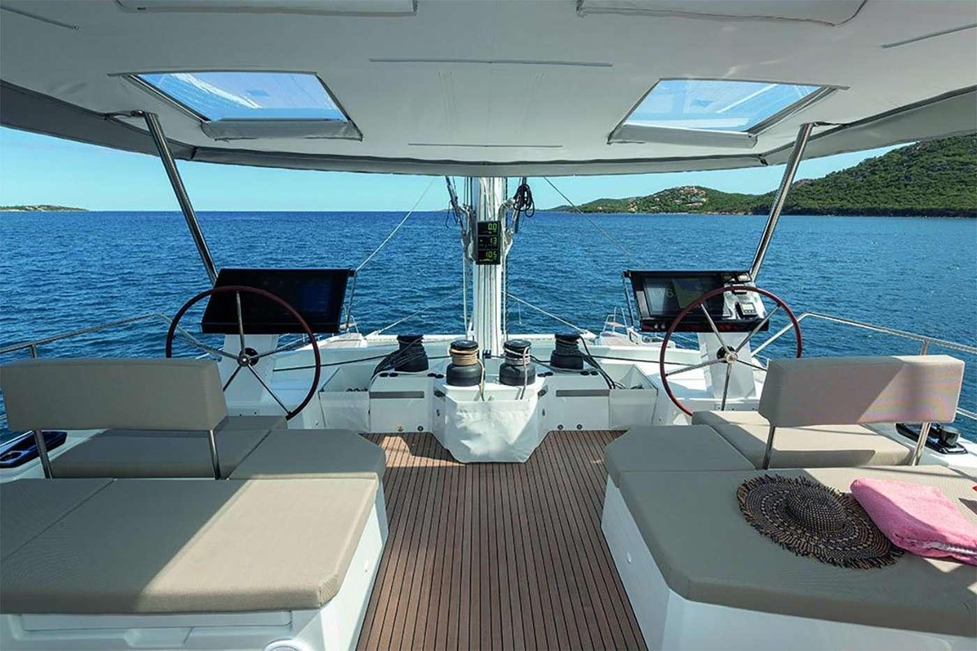 a boat on the water aboard OCEANUS Yacht for Charter