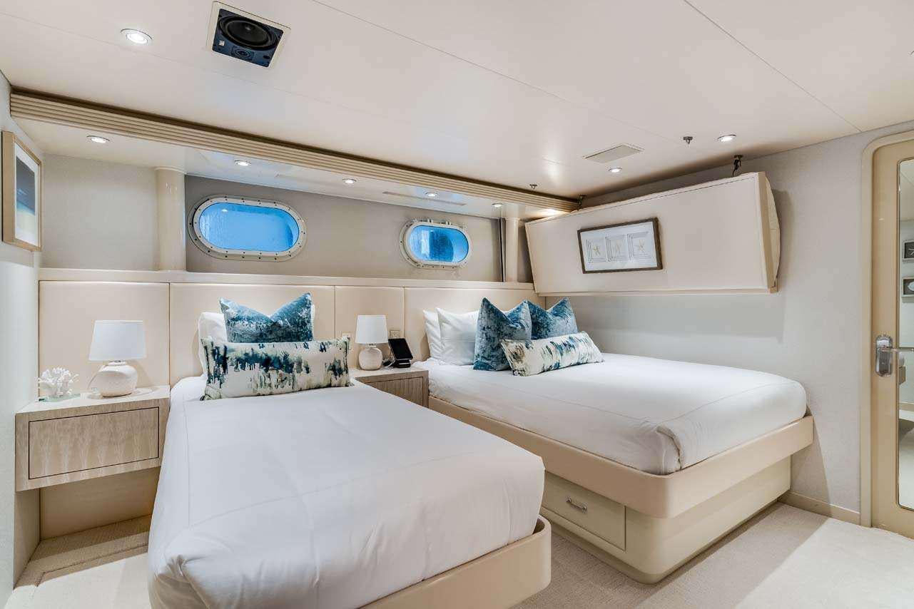 a room with two beds aboard CUPCAKE Yacht for Charter