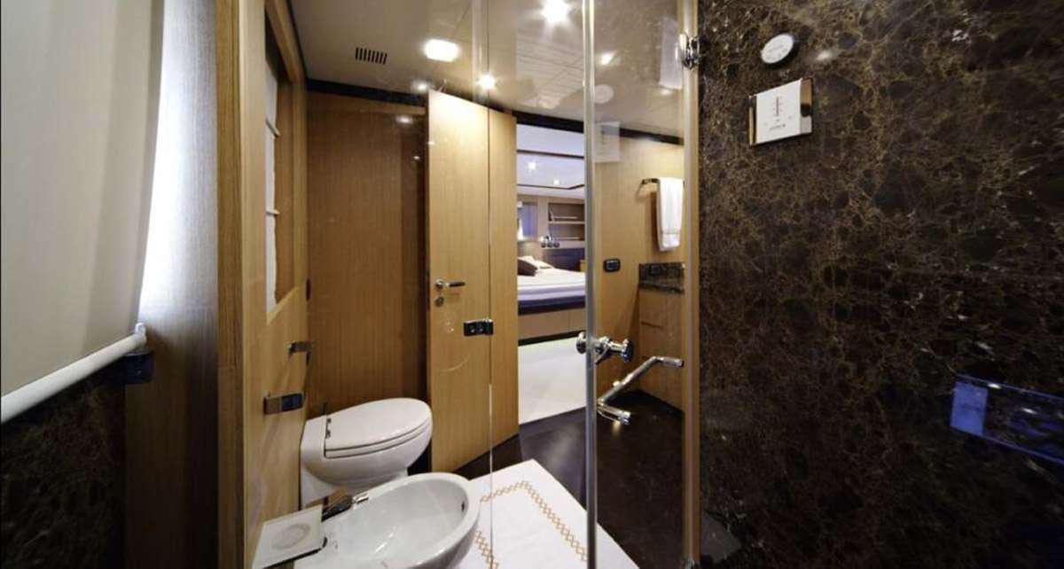 a bathroom with a glass shower aboard BLUE HEAVEN 2 Yacht for Charter