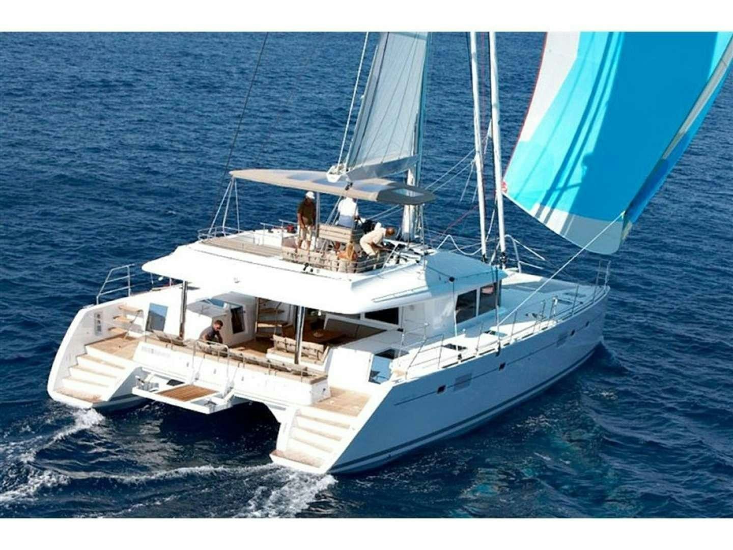 a boat on the water aboard ISLAS CHAFARINAS  Yacht for Charter